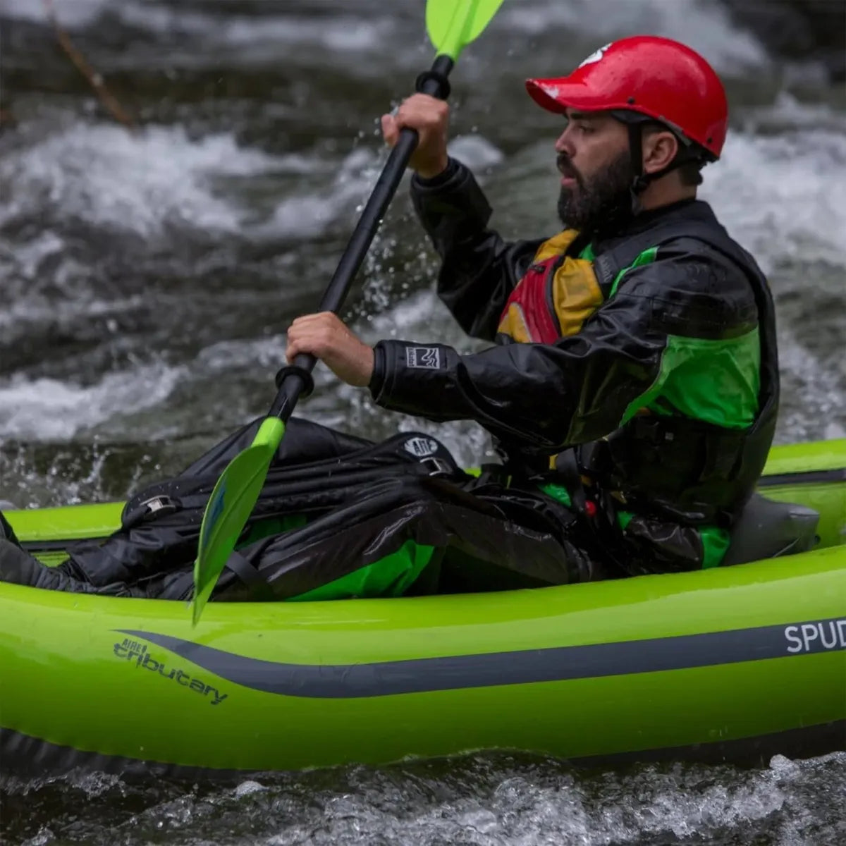 AIRE Deluxe thigh straps with thwart handle for secure seating in inflatable kayaks, shown in black and red design.