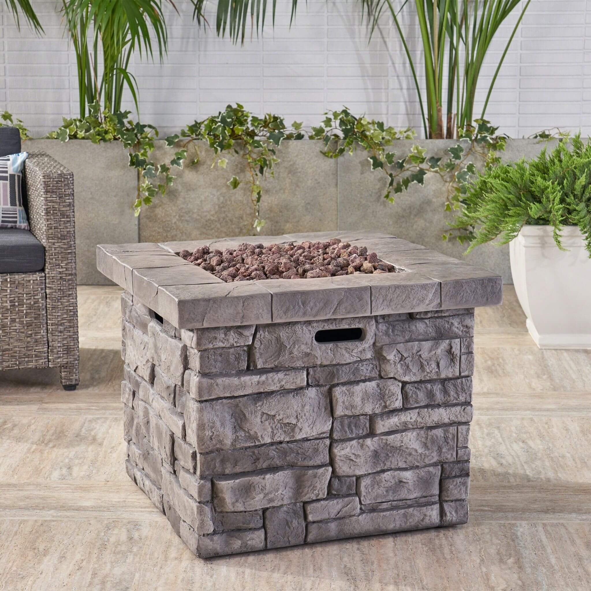 Alora 30-inch modern outdoor propane fire table with steel frame and lava rocks, perfect for outdoor gatherings.