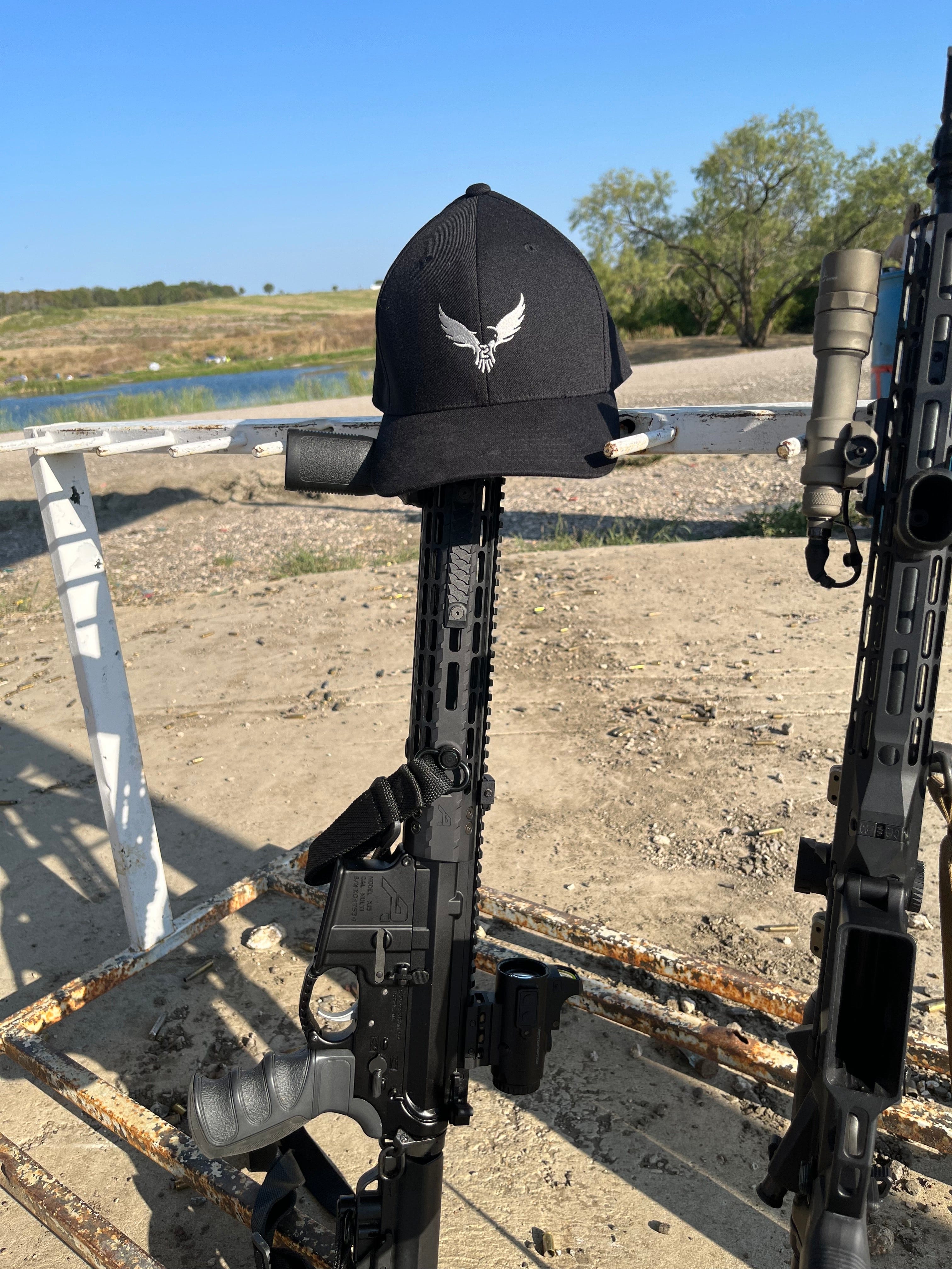 SFT2 Tactical minimalist cap in black with curved brim and adjustable strap, casual outdoor apparel accessory.
