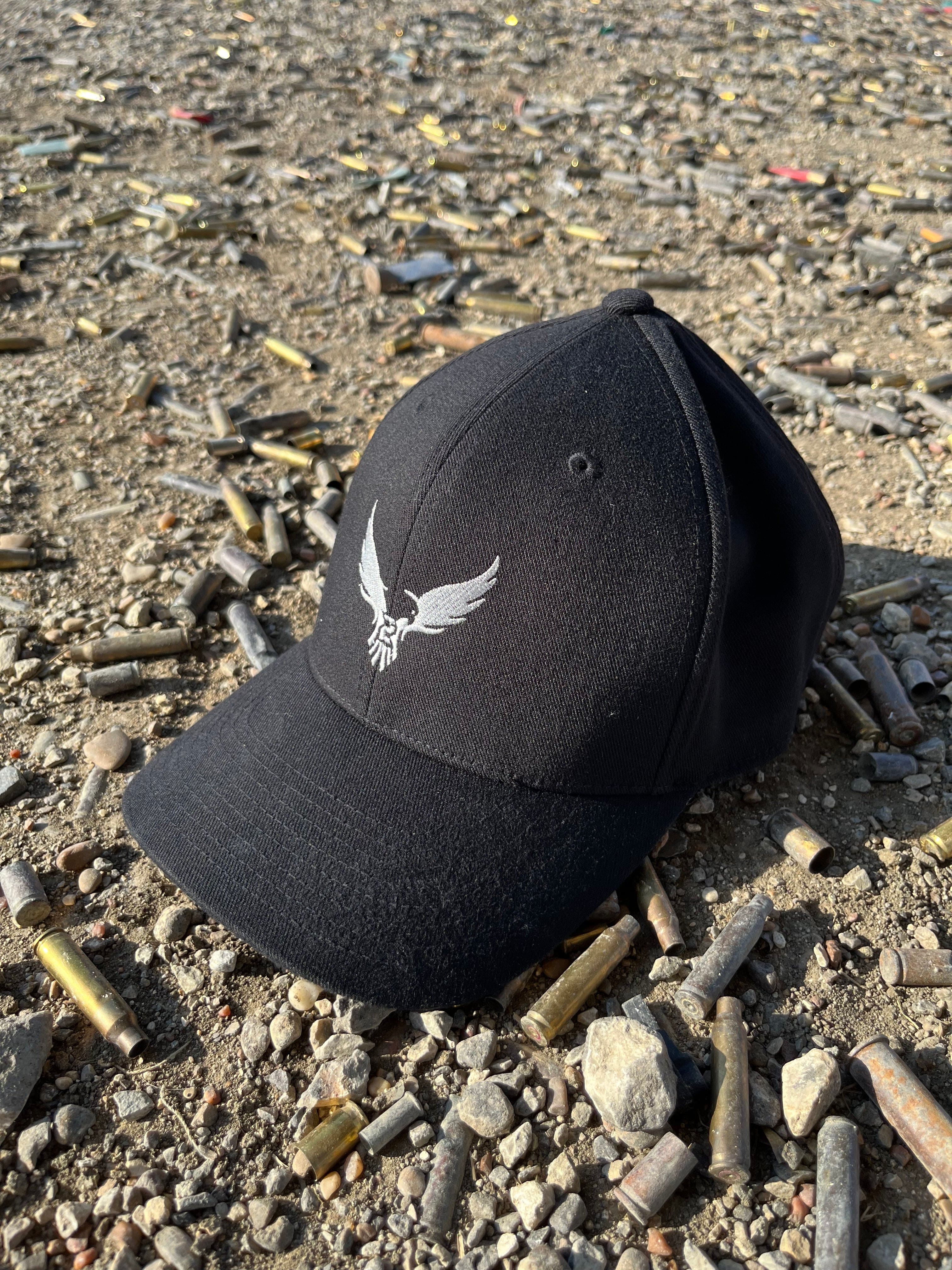 SFT2 Tactical minimalist cap in black with curved brim, adjustable strap, and clean design, ideal for casual or tactical wear.