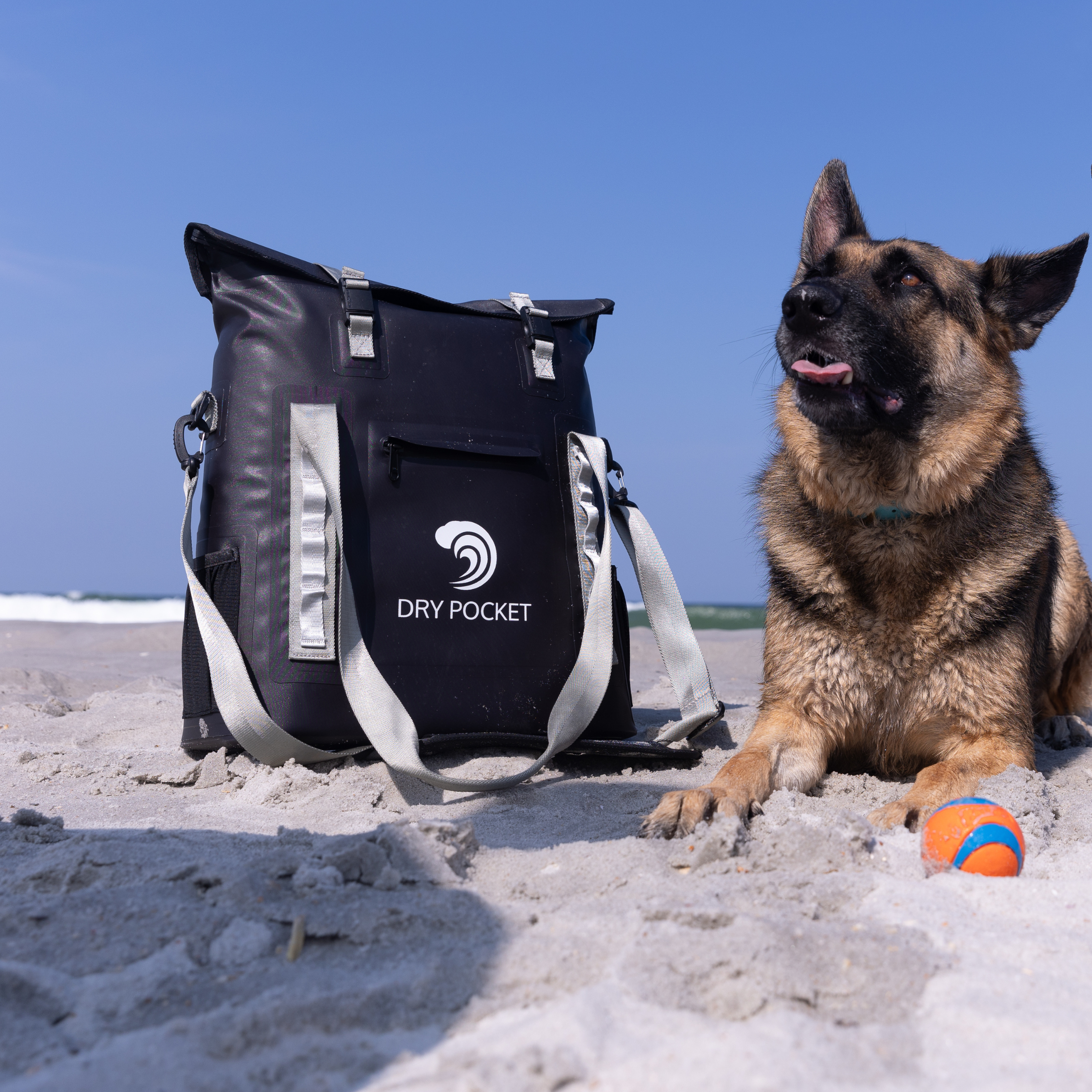 Aqua blue Dry Pocket waterproof floating tote cooler with auto-sealing closure, designed as a versatile backpack for keeping items dry.