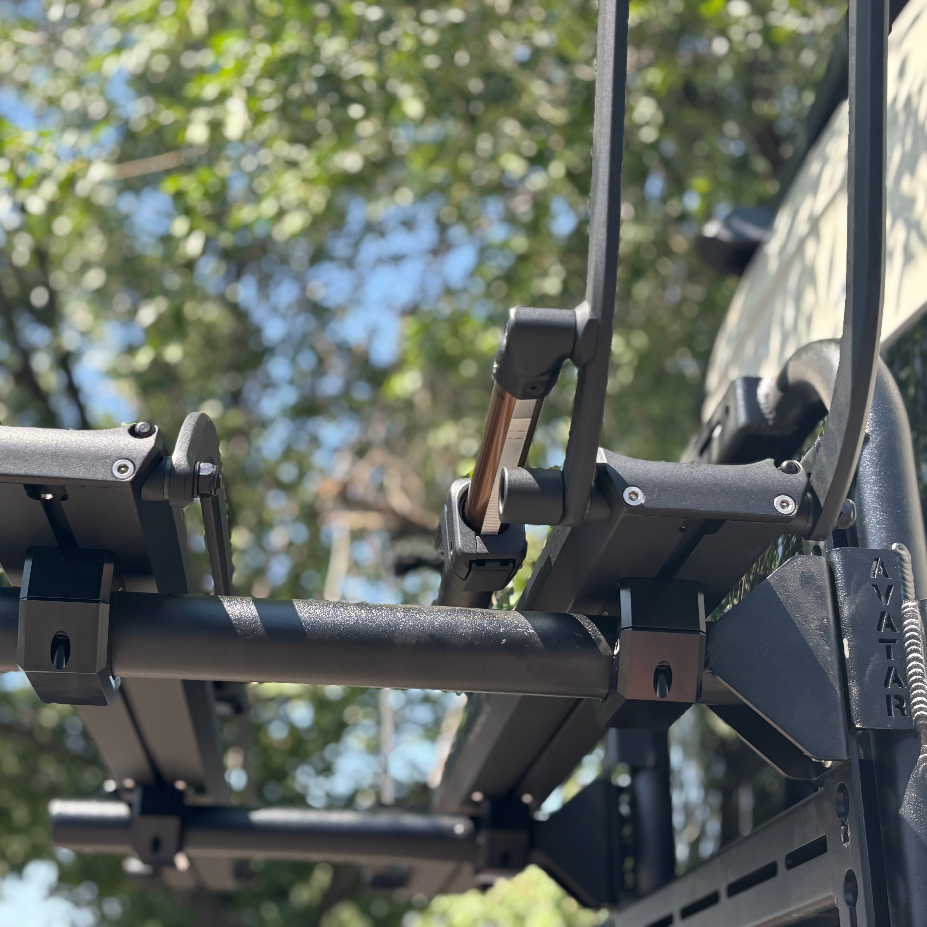 Avatar Offroad Bike Posts for Massif mount, sturdy bike rack attachment for off-road vehicles, shown on a rugged vehicle exterior.