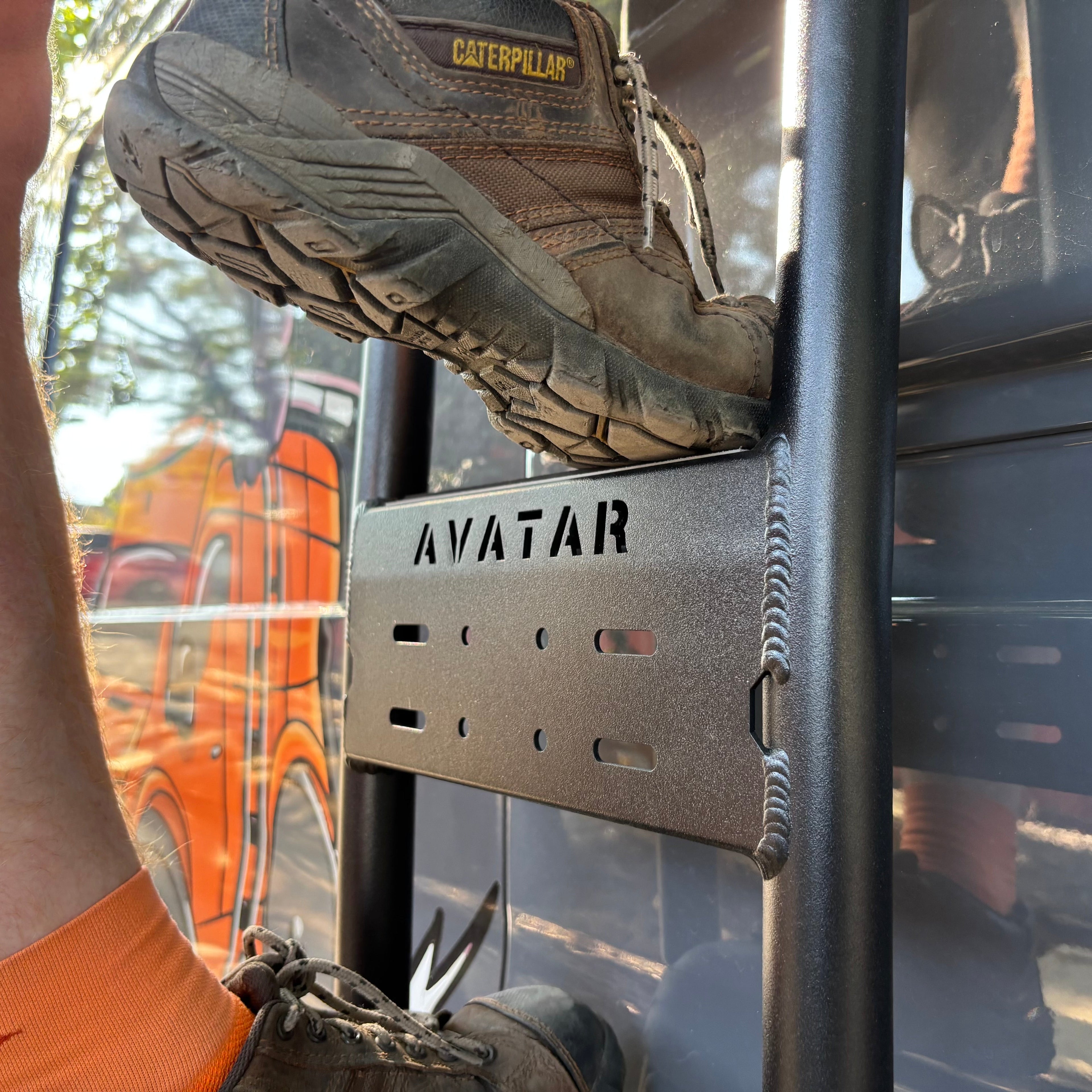 Mercedes Sprinter Van side ladder by Avatar Offroad, durable aluminum ladder attached to van side for easy roof access.