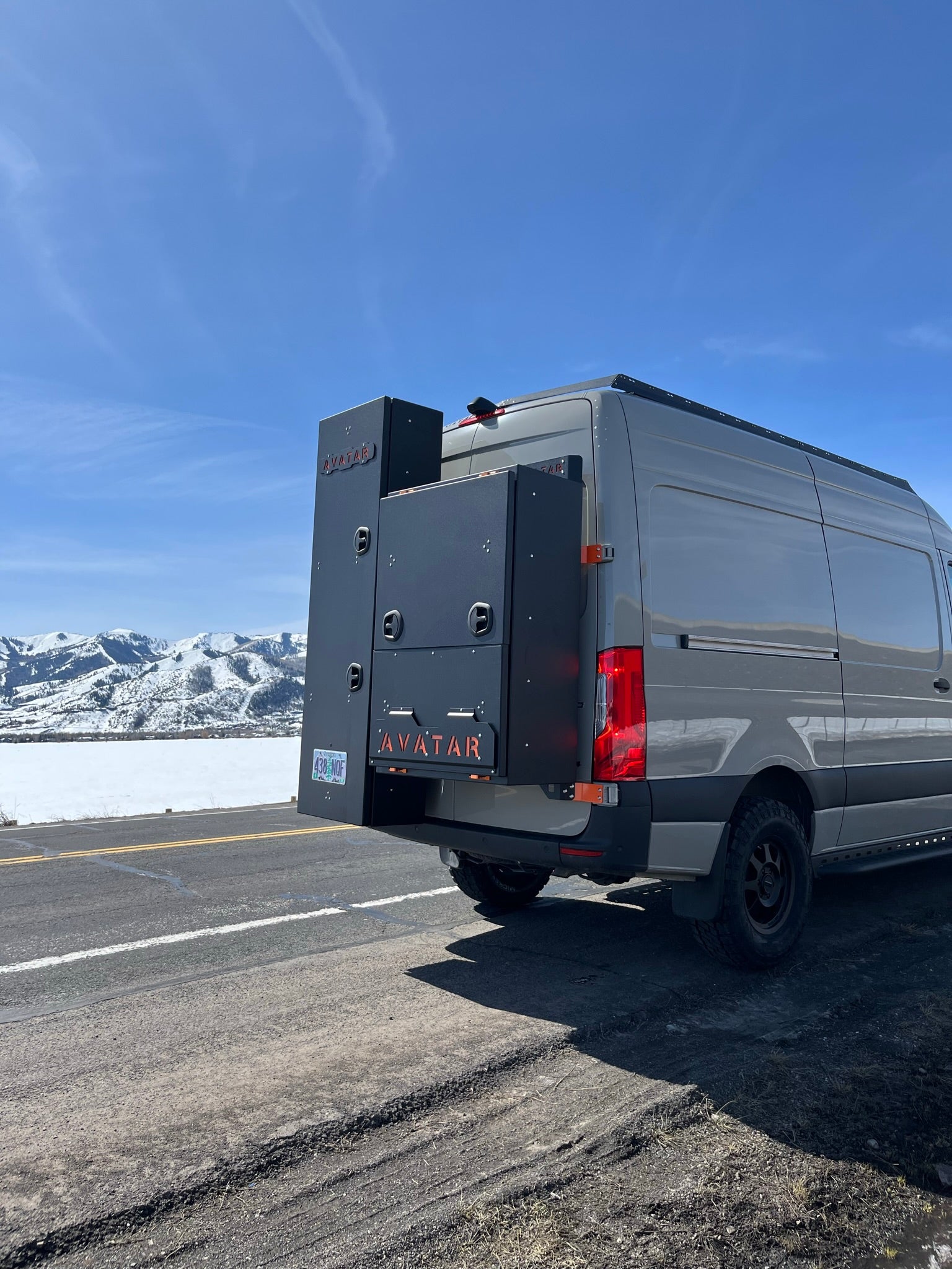 Avatar Offroad Ultra Rack for Sprinter Vans, low profile roof rack with sturdy metal construction and sleek design, mounted on van roof.