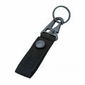 Outdoor nylon eagle beak hook by Bean's Moto Booth, rugged metal hook with durable nylon strap for outdoor gear attachment.