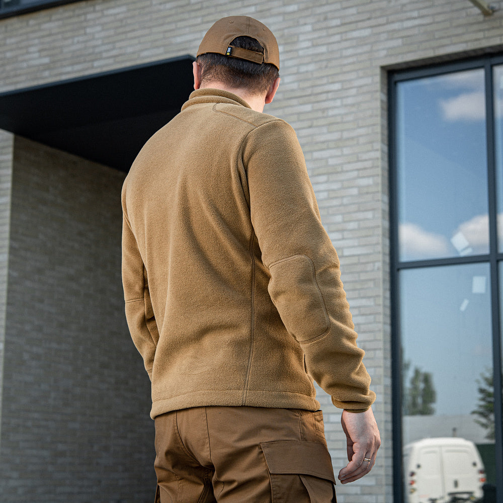 M-TAC Nord Polartec fleece jacket in dark color, showcasing a soft texture and practical design for outdoor activities.