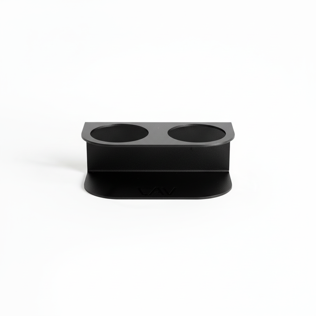 Magnetic dual cupholder made in Utah by Canyon Adventure Vans, featuring two secure slots for beverages with a rugged design.