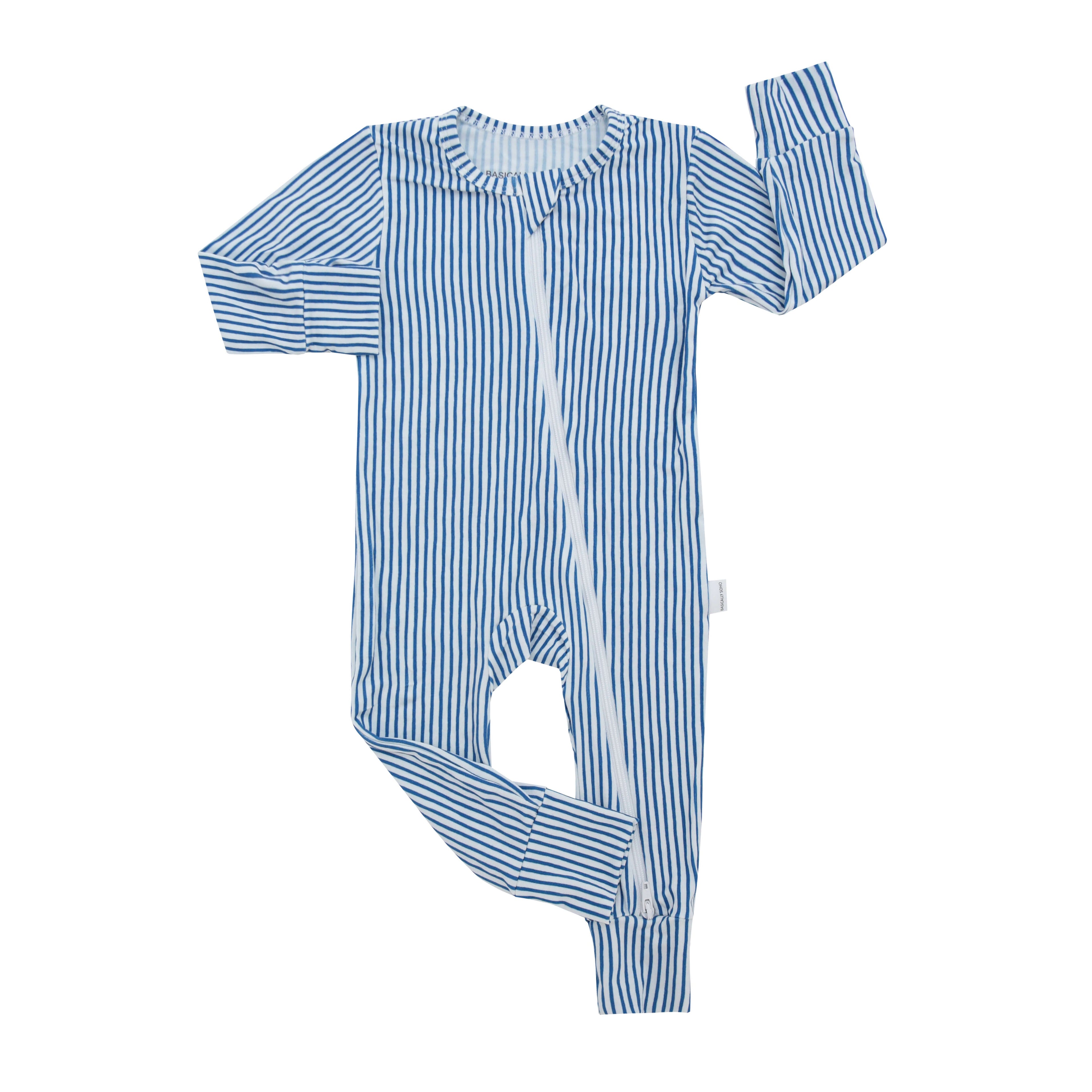 Basically Soho Miami Cabana Stripe Zippered Romper in navy, featuring a stylish striped design and front zipper detail.