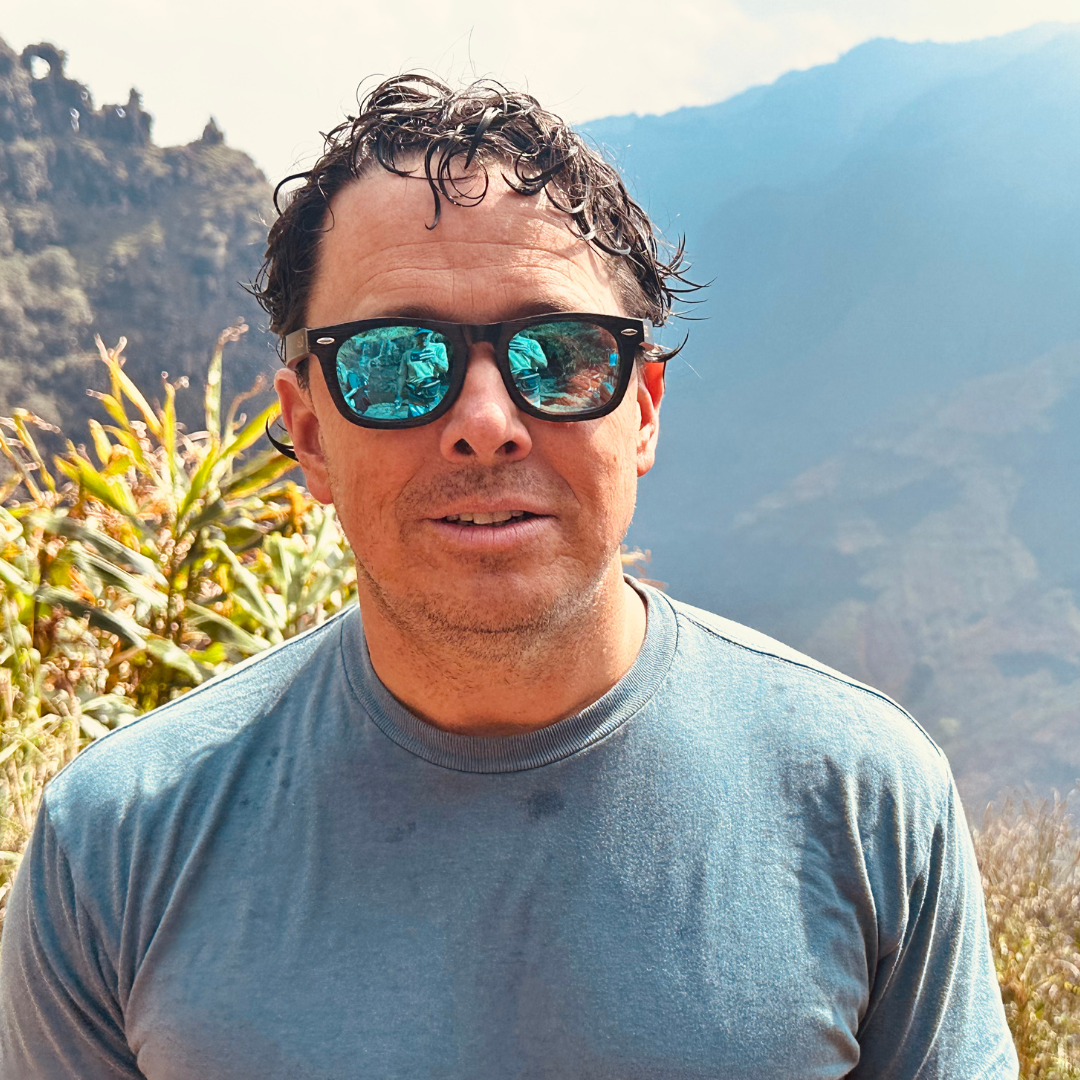 Black bamboo floating sunglasses by Eastern Outer with sleek, modern design and durable bamboo frames.