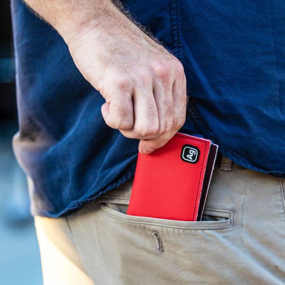 ZeITBIKE Alchemy Goods Belltown Wallet with red vinyl upholstery, compact design and multiple card slots.