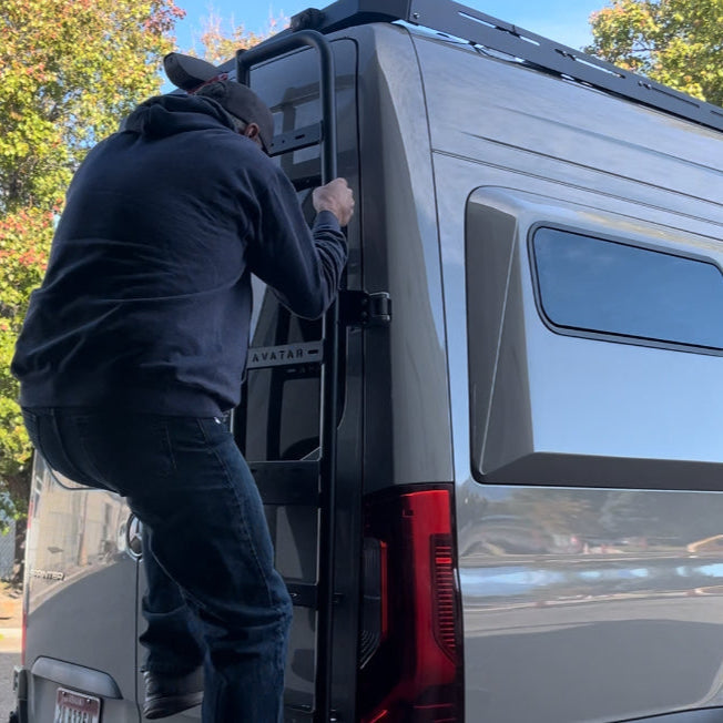 Avatar Offroad Sprinter Van rear ladder installed on the back of a van, showing sturdy metal construction and easy climbing design.