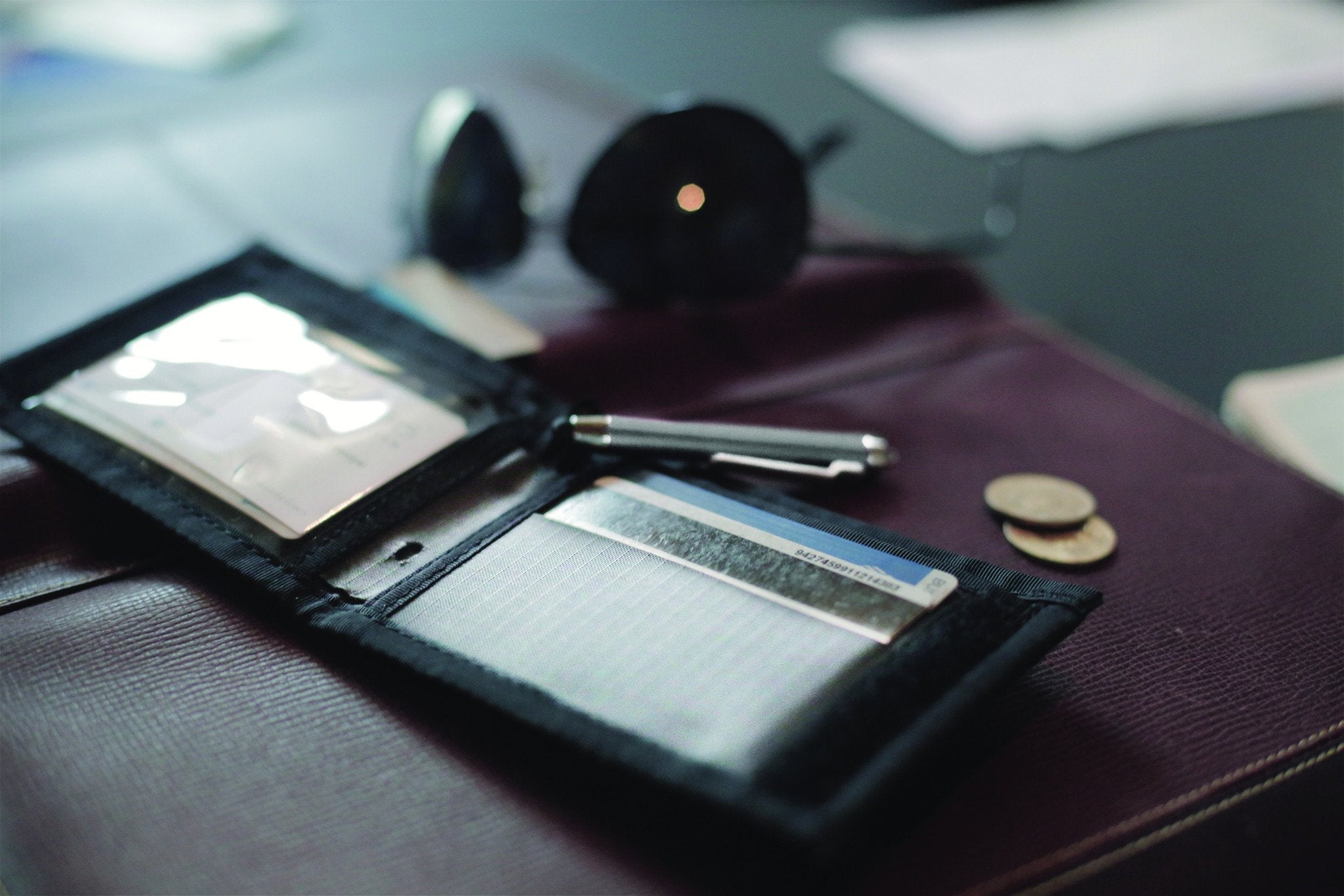 GrandTrunk bi-fold travel wallet with multiple card slots and cash compartment, made of durable materials.