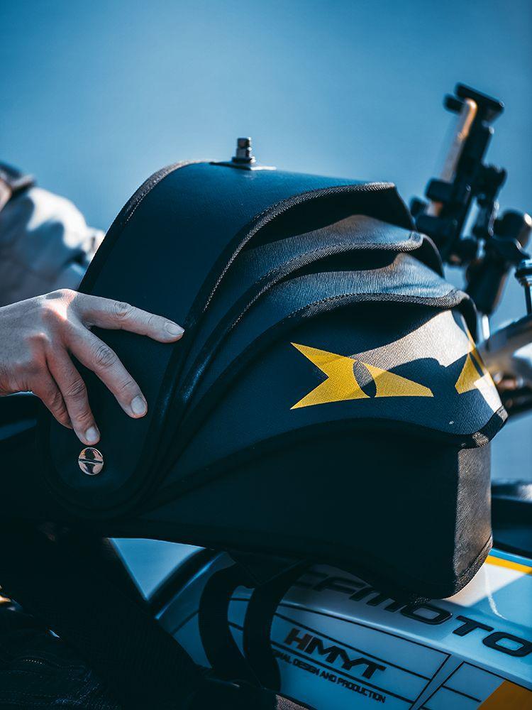 Bean's Moto Booth BINSONWHALE™ Devil-Eye motorcycle helmet backpack with sleek design and adjustable straps, suited for riders.