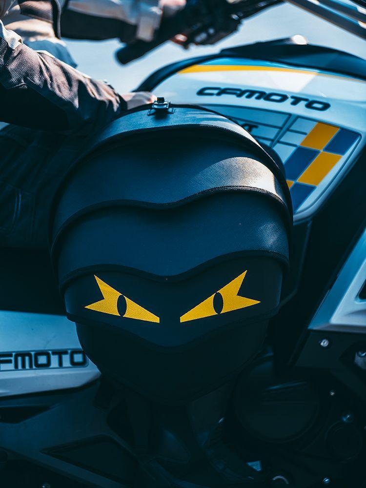 BinsonWHALE™ Devil-Eye motorcycle helmet backpack by Bean's Moto Booth, with sleek design and secure compartments for motorcycle gear.