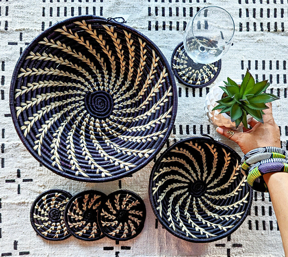 Large black and white woven African basket by Reflektion Design, showcasing intricate handwoven patterns and sturdy construction.