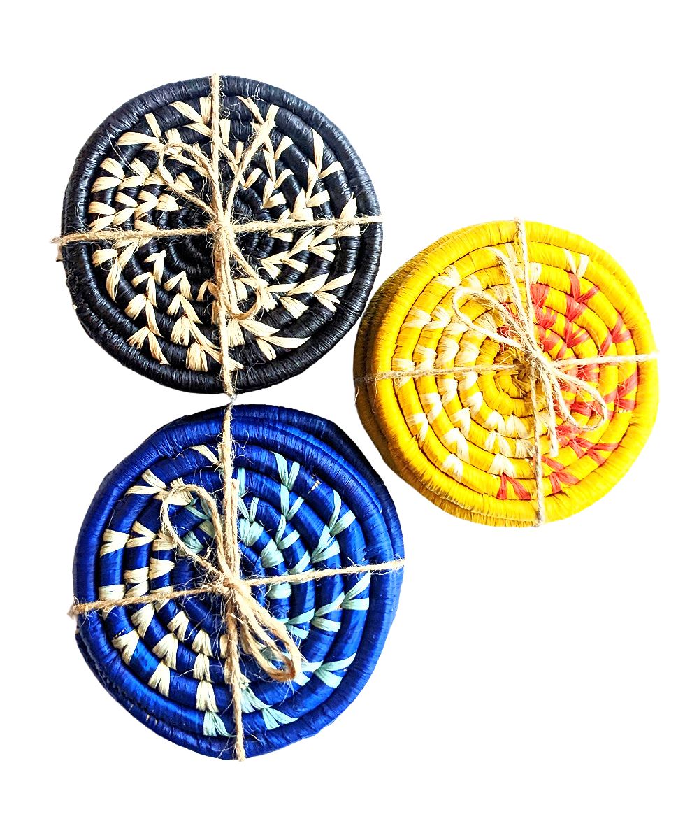 Handmade woven drink coasters set of 4 in blue, yellow, and black by Reflektion Design, showing colorful textured surface.