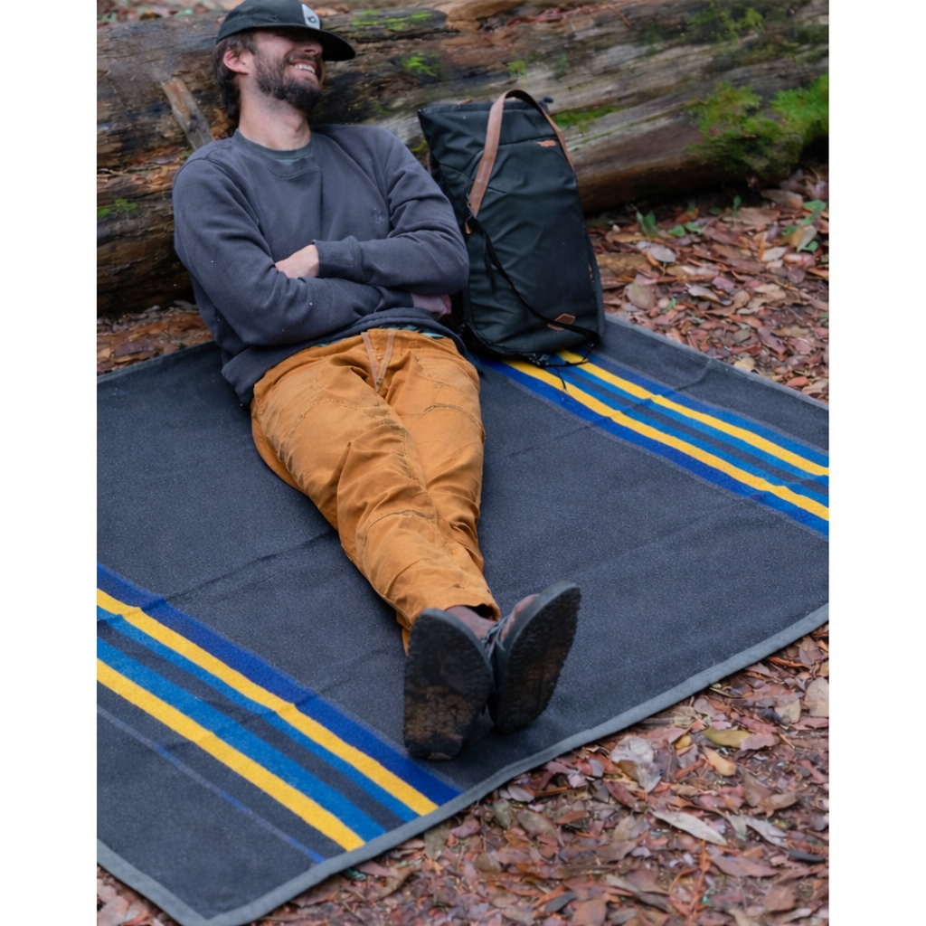 Blue waxed canvas camping blanket by West Path, outdoor throw blanket ideal for camping and bushcraft activities.