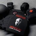 SFT2 Tactical Spartan Level IV ceramic body armor package with protective plates and adjustable straps, designed for ballistic protection.