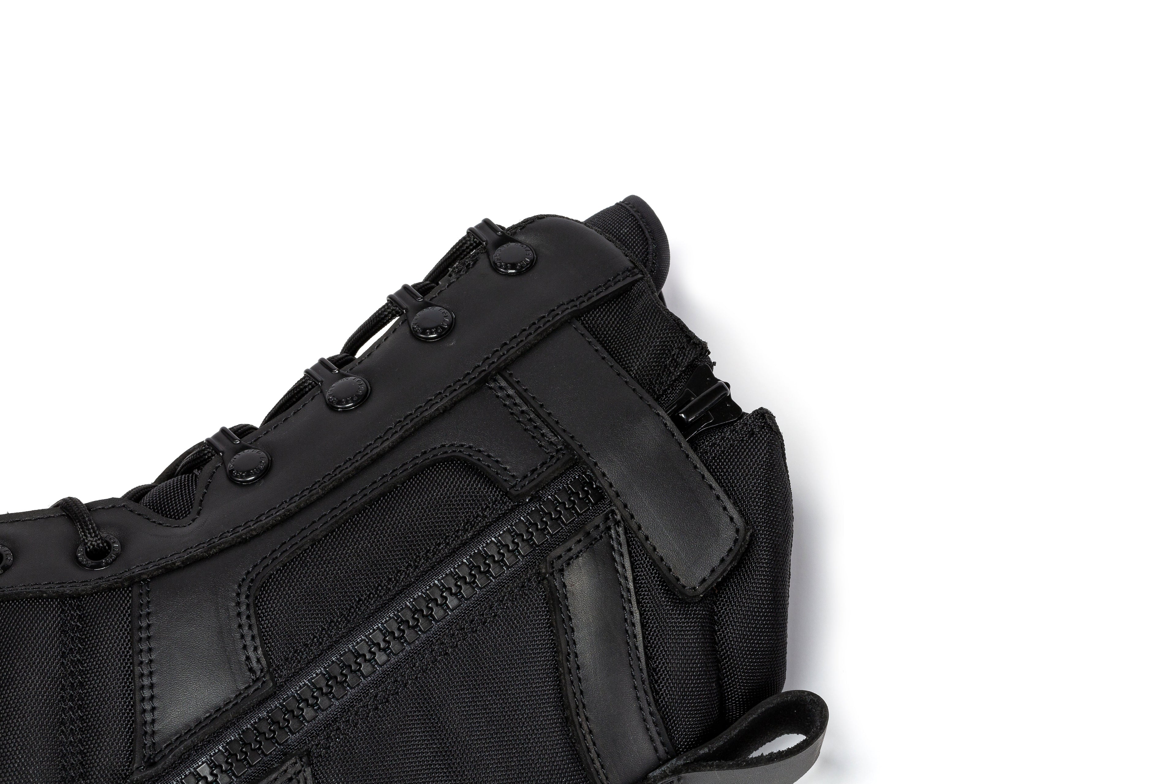 Black men's 8-inch tactical boots with side zipper and rubber sole by Rock Rooster Footwear Inc.