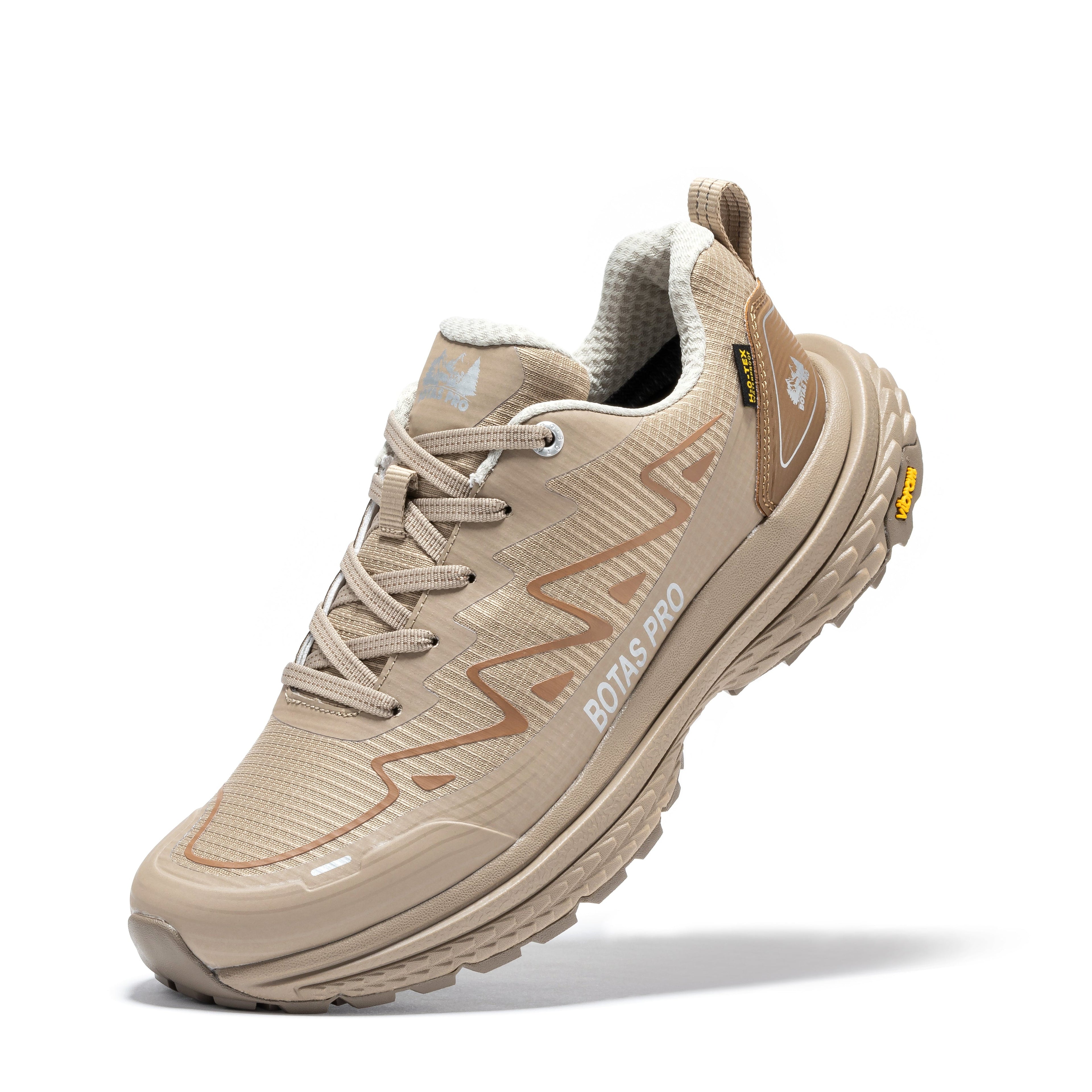 Khaki waterproof hiking boots by Rock Rooster Footwear Inc, 4-inch outdoor shoes with rugged soles and secure lacing.