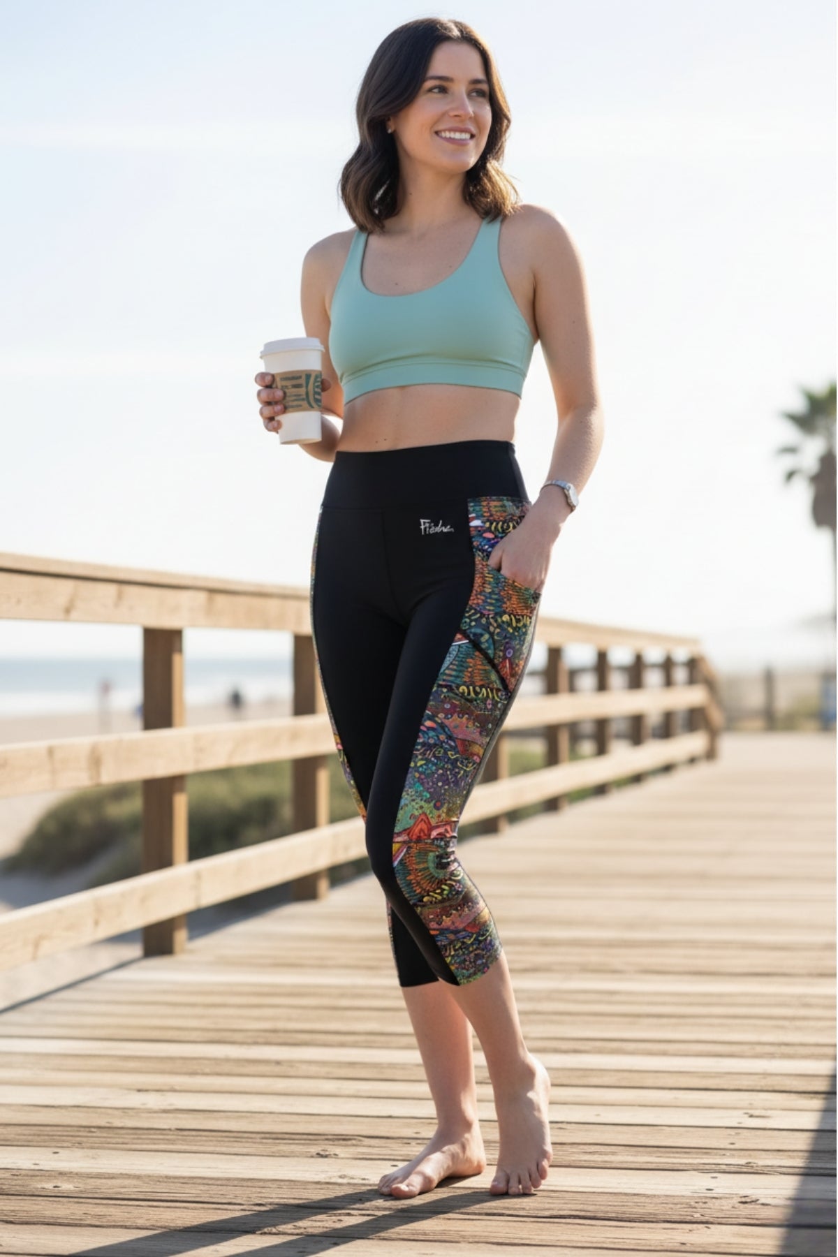 FisheWear Brookie Pocket Capri Leggings showing fitted black leggings with side pockets and a comfortable stretch fit.