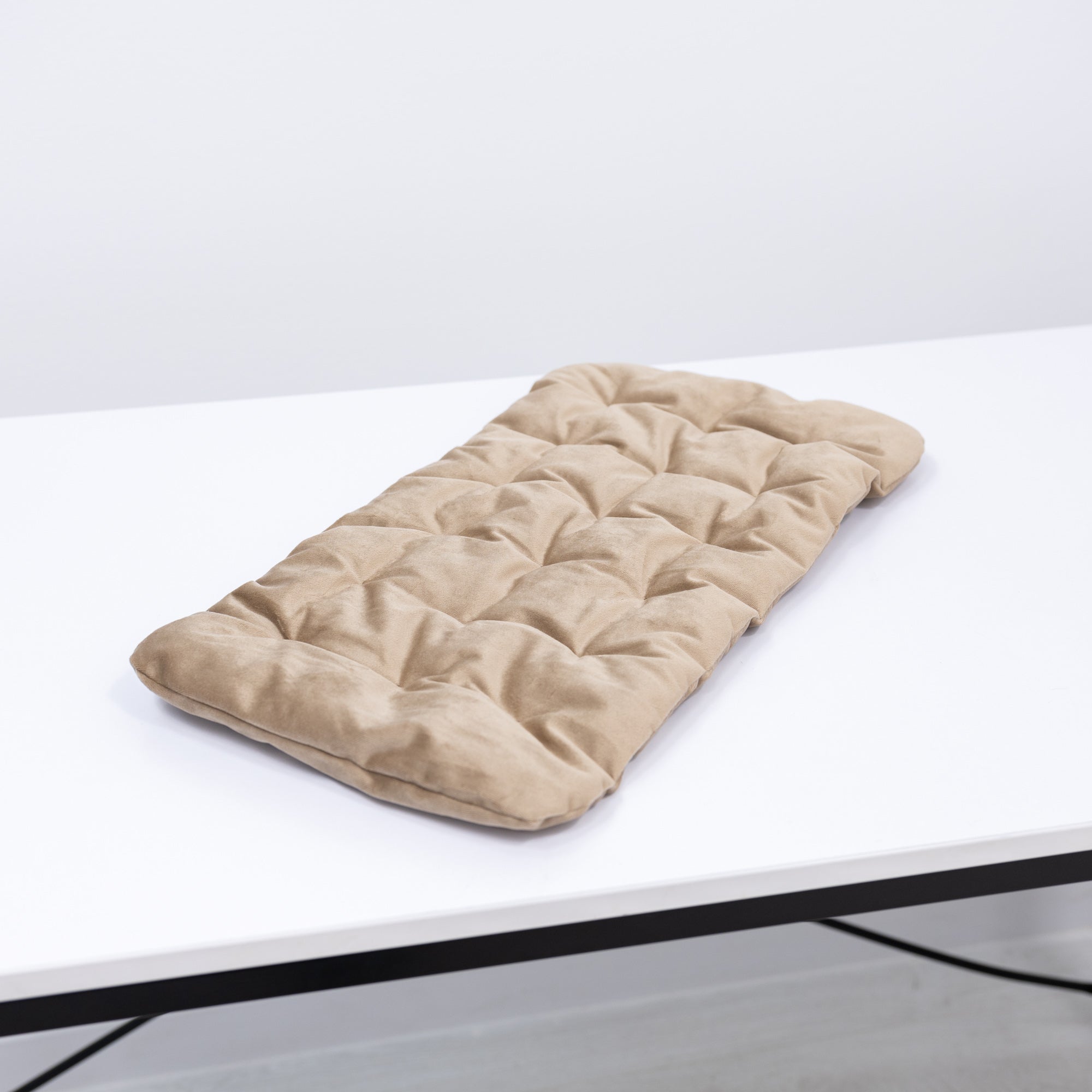 Brown sleeping cat-shaped bed pillow from Enjoy The Wood, cozy cushion designed for comfort and decorative appeal.