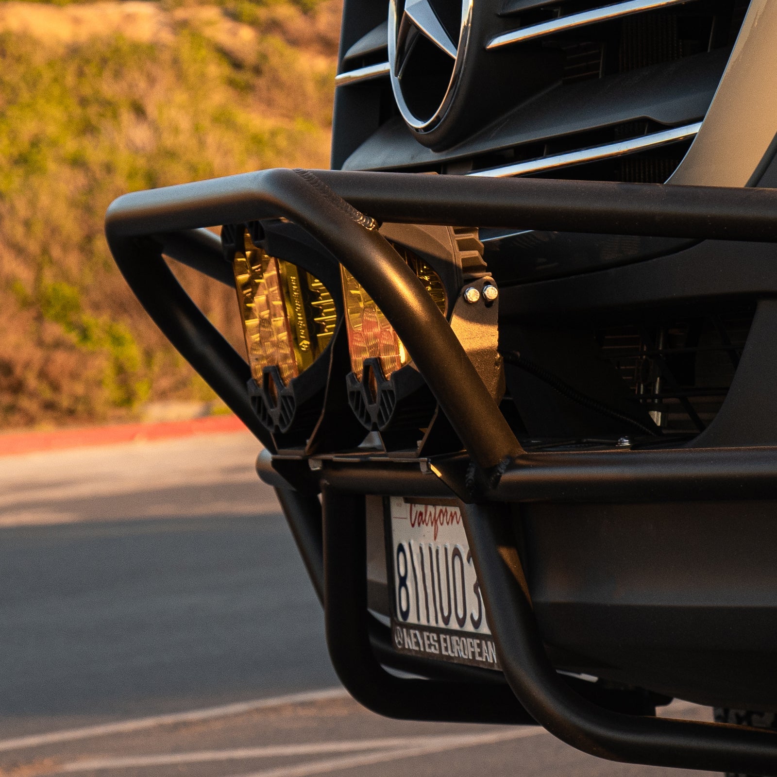 Sprinter Baja Bumper by The Van Mart, showcasing a rugged black design for enhanced van exterior protection.