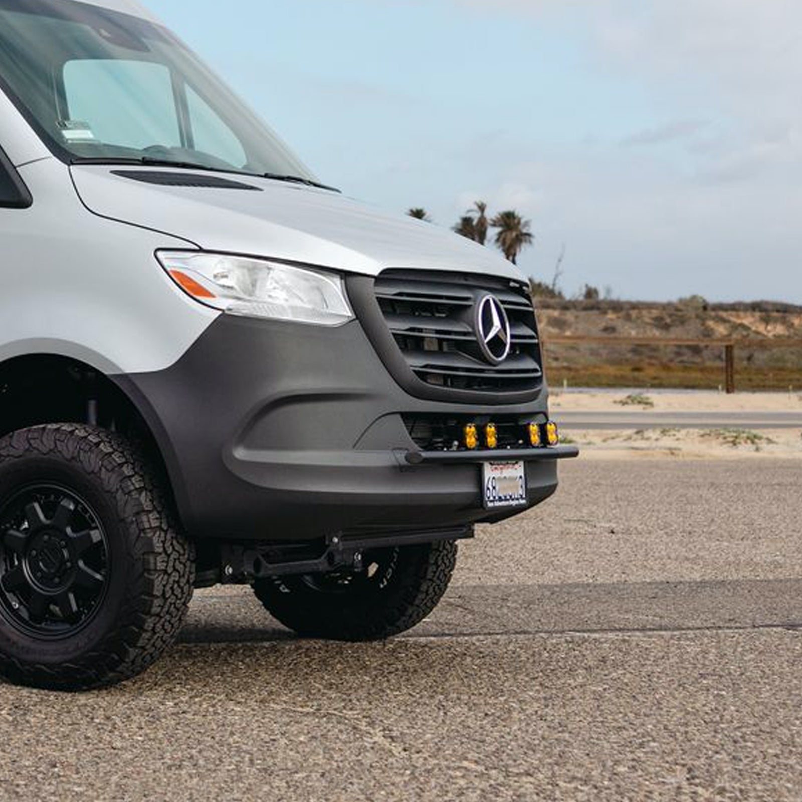 Sprinter Defender Bumper by The Van Mart, showcasing durable exterior protection for vans in a sleek design.