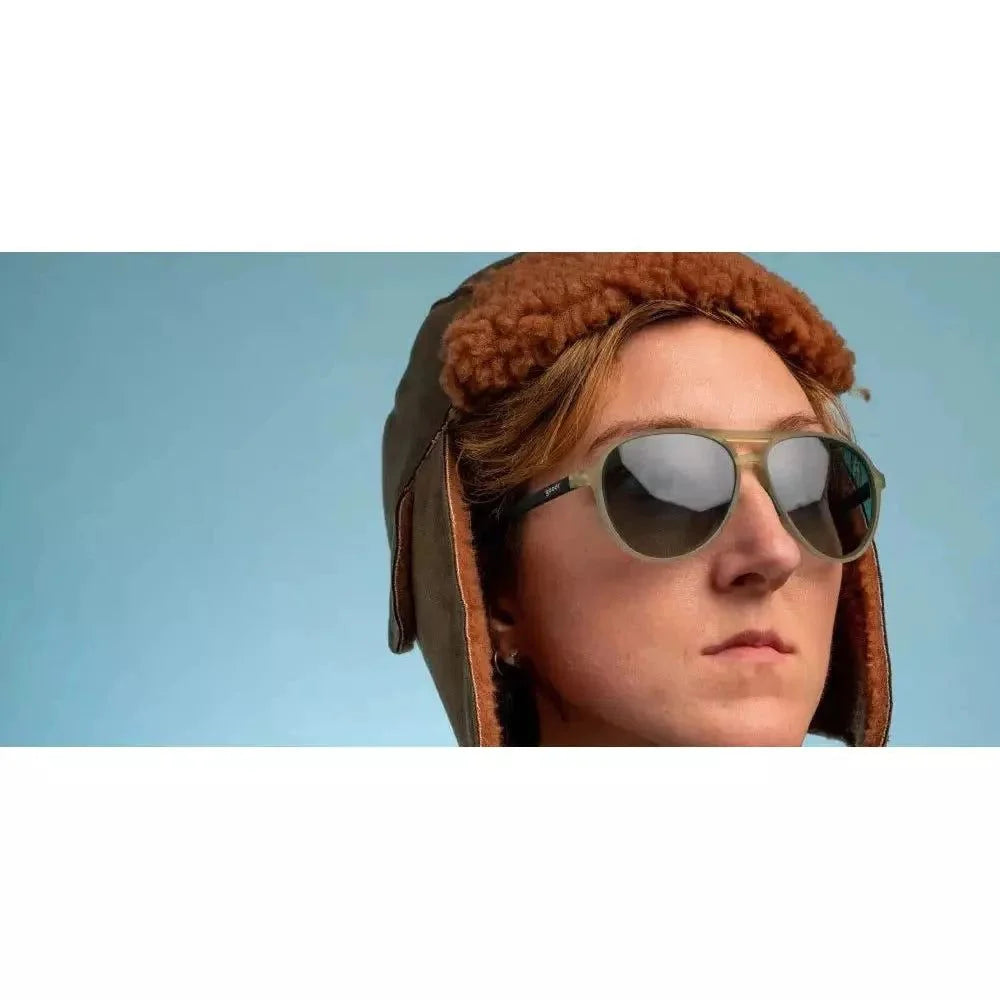 Rare Air Discs Buzzed On The Tower polarized sunglasses on a person's face, showcasing sleek accessory design and tinted lenses.