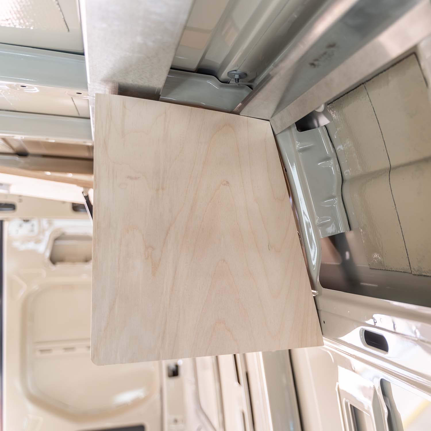 Timber Van Kits overhead cabinet panels for Promaster van campervan structural assembly, showing sturdy panel construction.