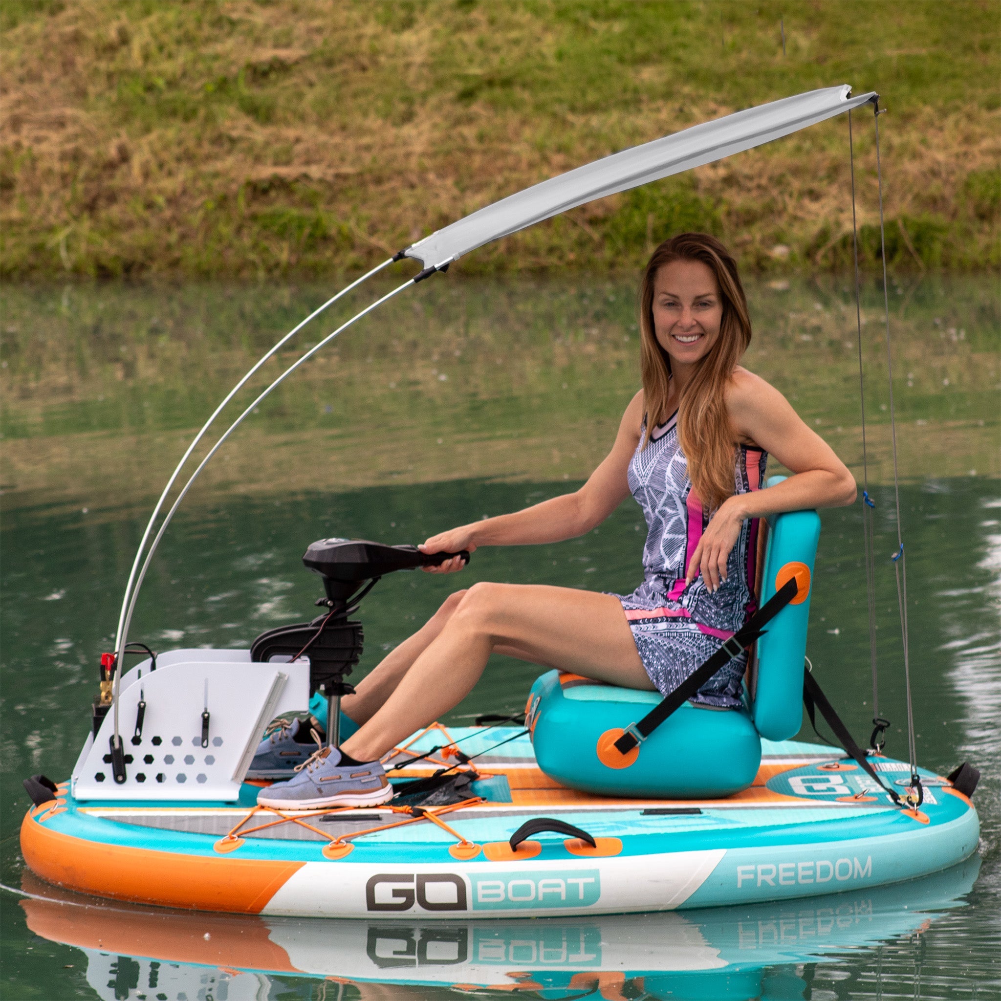 GoBoat canopy in navy blue, weather-resistant fabric with clear windows and adjustable straps for outdoor boat protection.