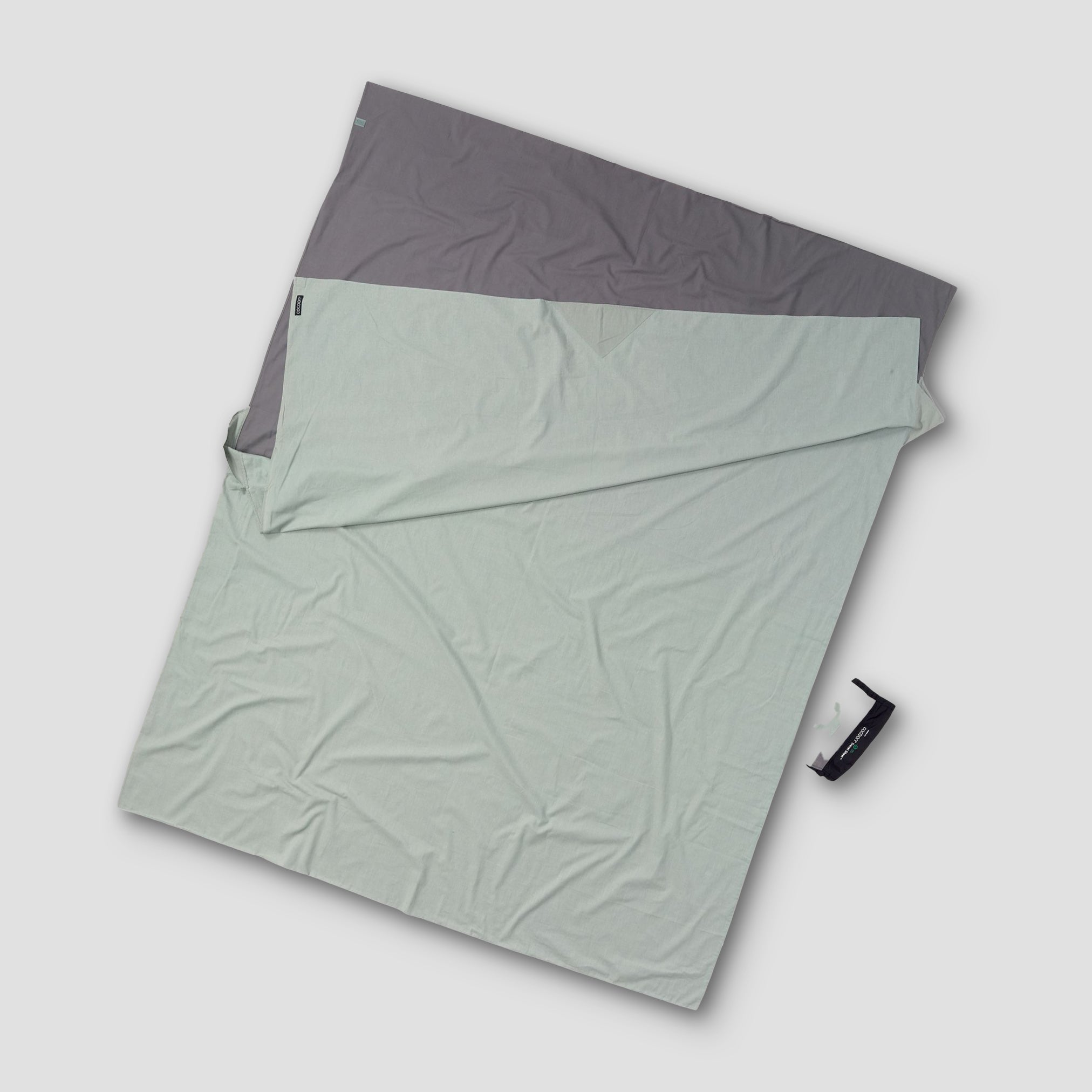 Double-size Cotton TravelSheet™ by COCOON featuring a lightweight, breathable fabric for comfortable travel and outdoor use.