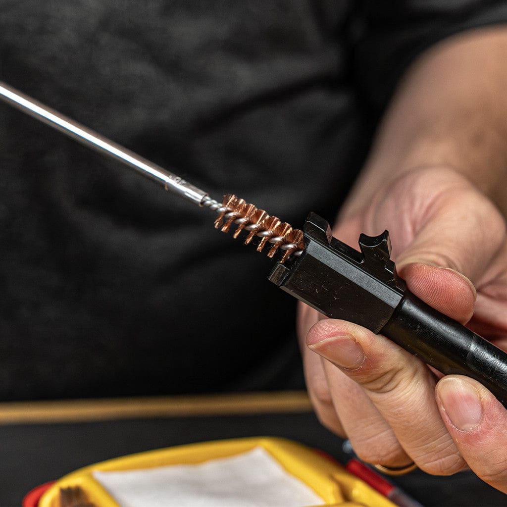 SFT2 Tactical rifle caliber cleaning kit with brushes, rods, and patches for effective firearm maintenance.