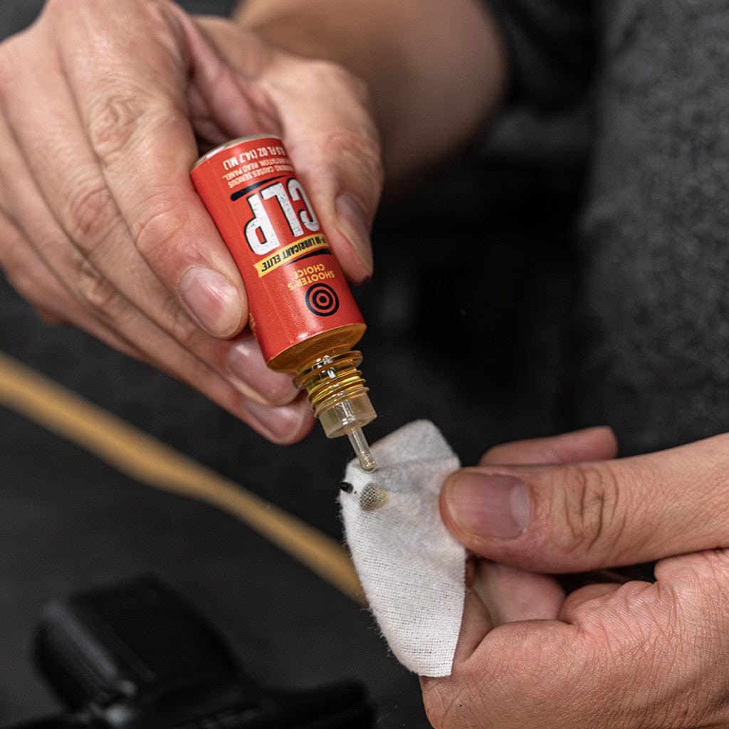 SFT2 Tactical rifle caliber cleaning kit with brushes and cleaning tools for firearm maintenance.