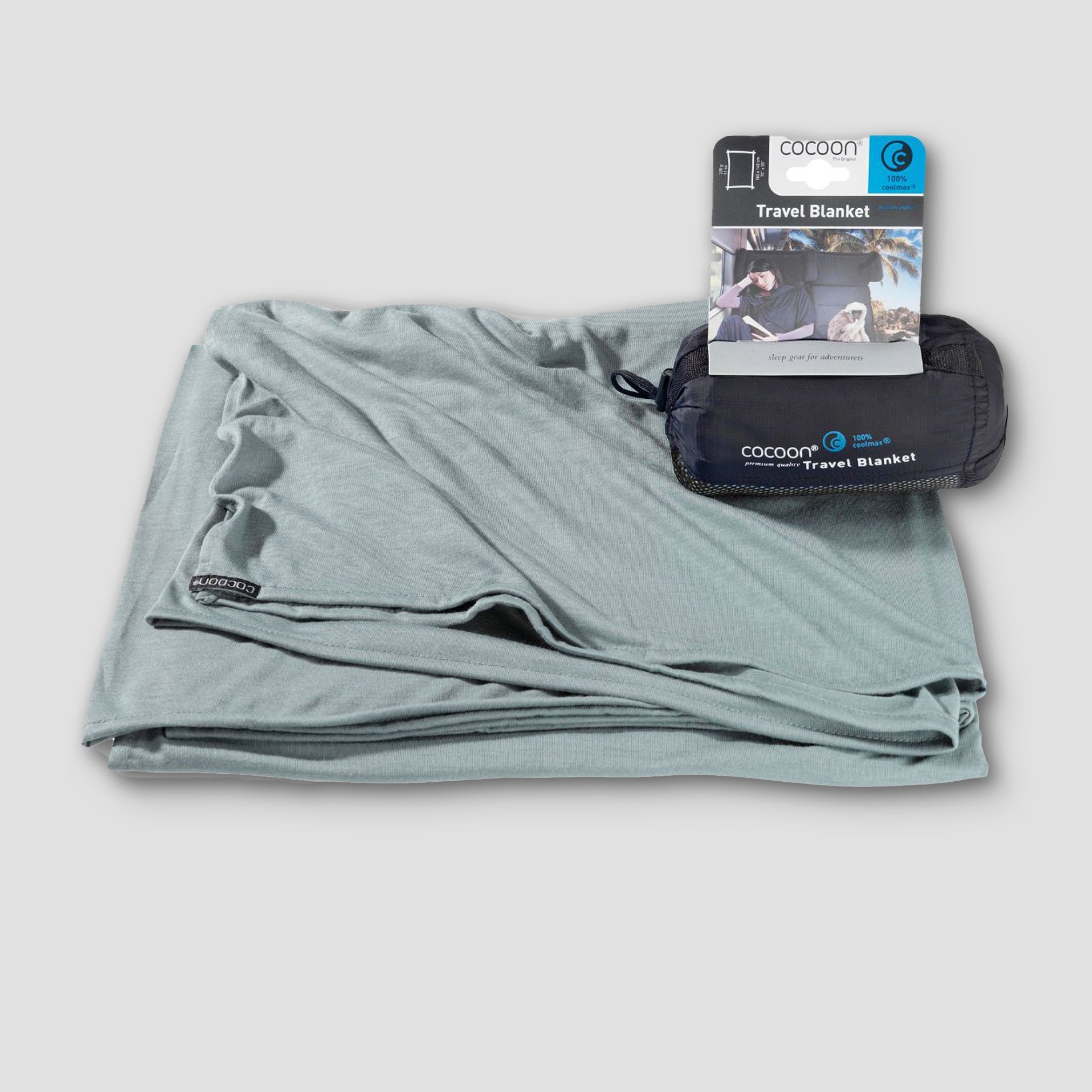 COCOON COOLMAX® travel blanket in a compact design, showcasing its soft texture and lightweight material.