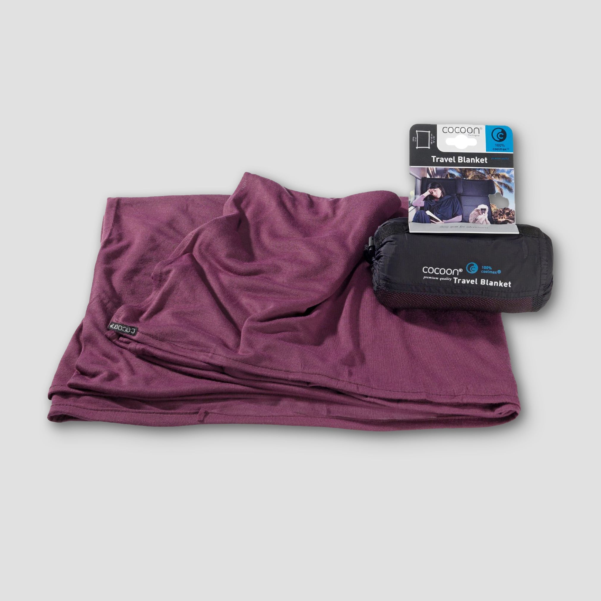 Cocoon COOLMAX® travel blanket in a folded position, showcasing soft fabric and lightweight design for comfort on the go.