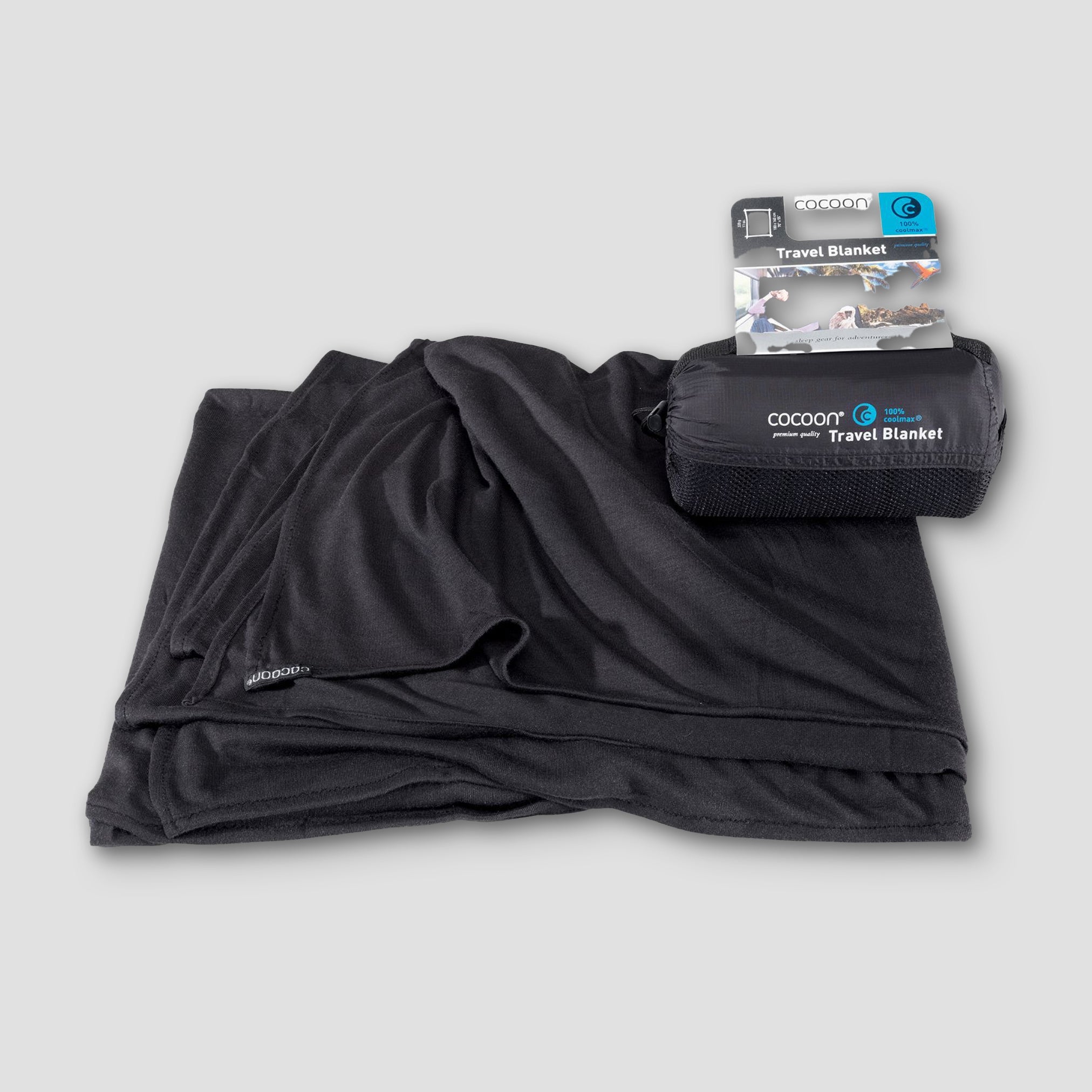 COCOON COOLMAX® travel blanket showcasing a lightweight, breathable design in a compact form for easy portability.