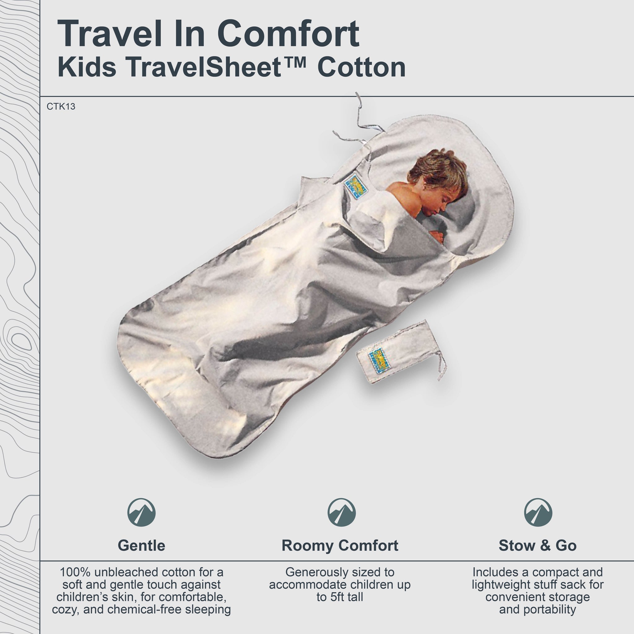 Kids TravelSheet™ Cotton by COCOON, soft cotton travel sheet for children, shown stretched out on a bed with colorful bedding.