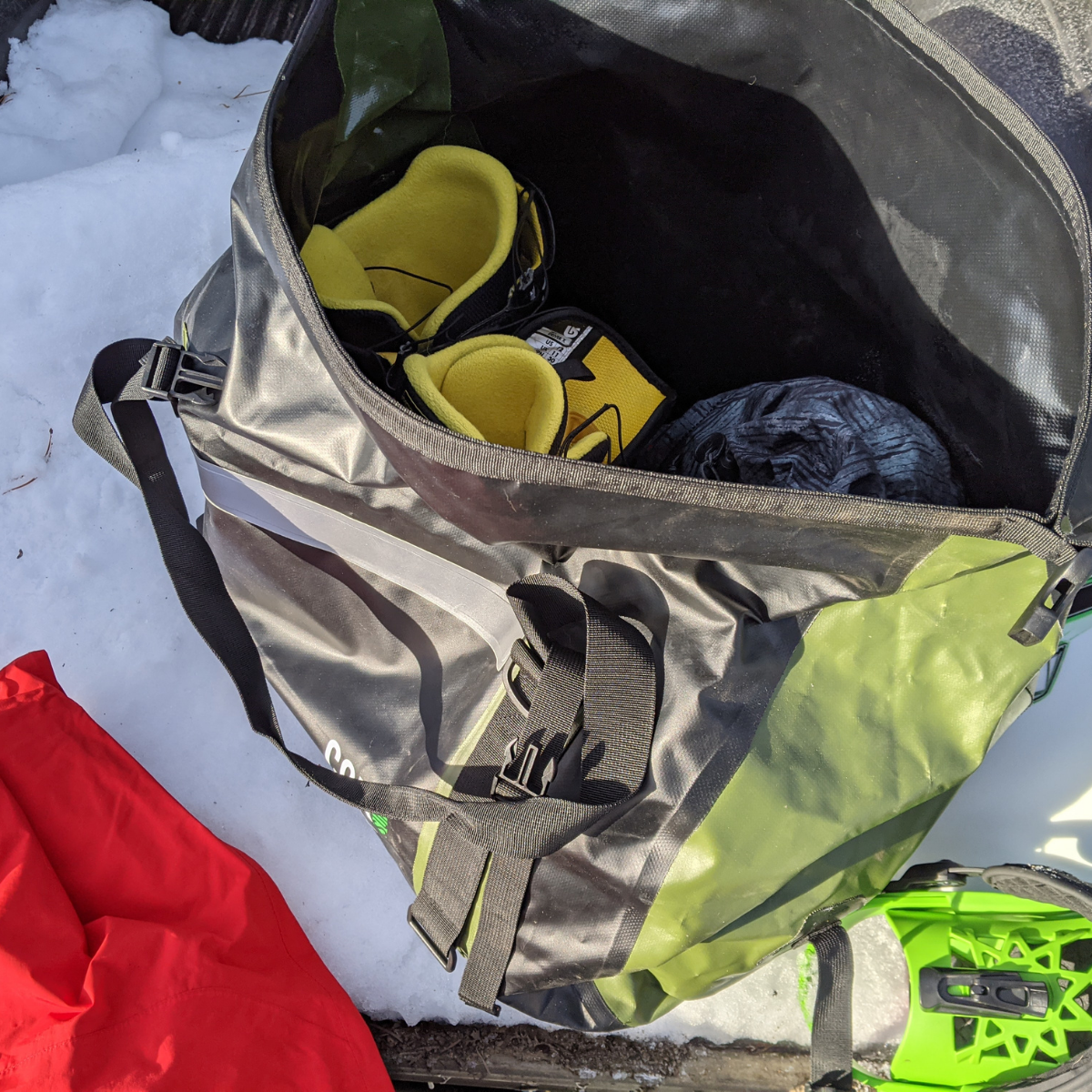 Open waterproof COR Surf roll-top dry duffel bag in 60L size, showing spacious interior and durable waterproof material.