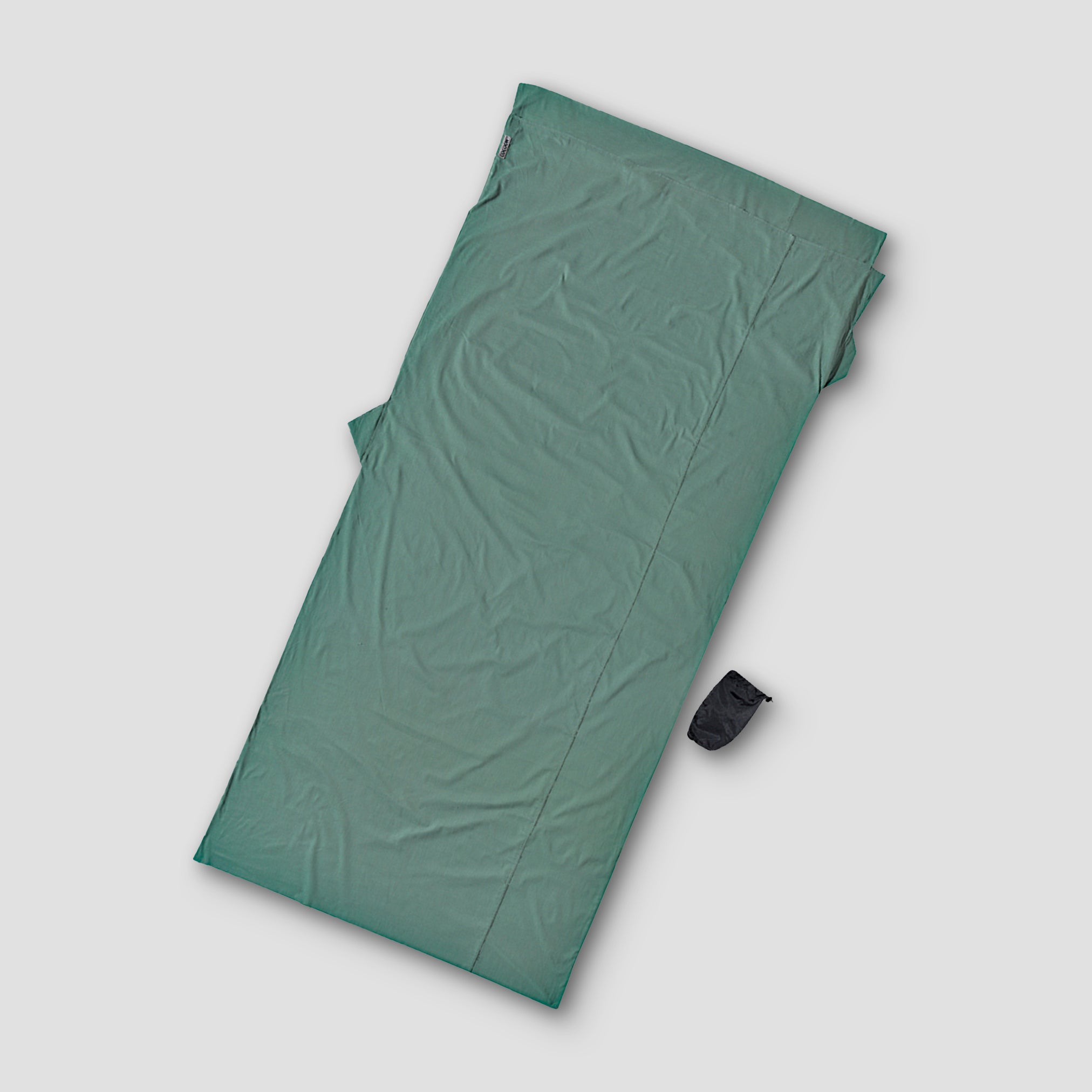 Cotton XL TravelSheet™ by COCOON, showing its soft, breathable fabric and spacious design for comfortable travel sleep.