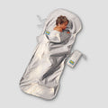 Kids TravelSheet™ Cotton by COCOON, lightweight white cotton sleeping bag for children, shown laid out flat.