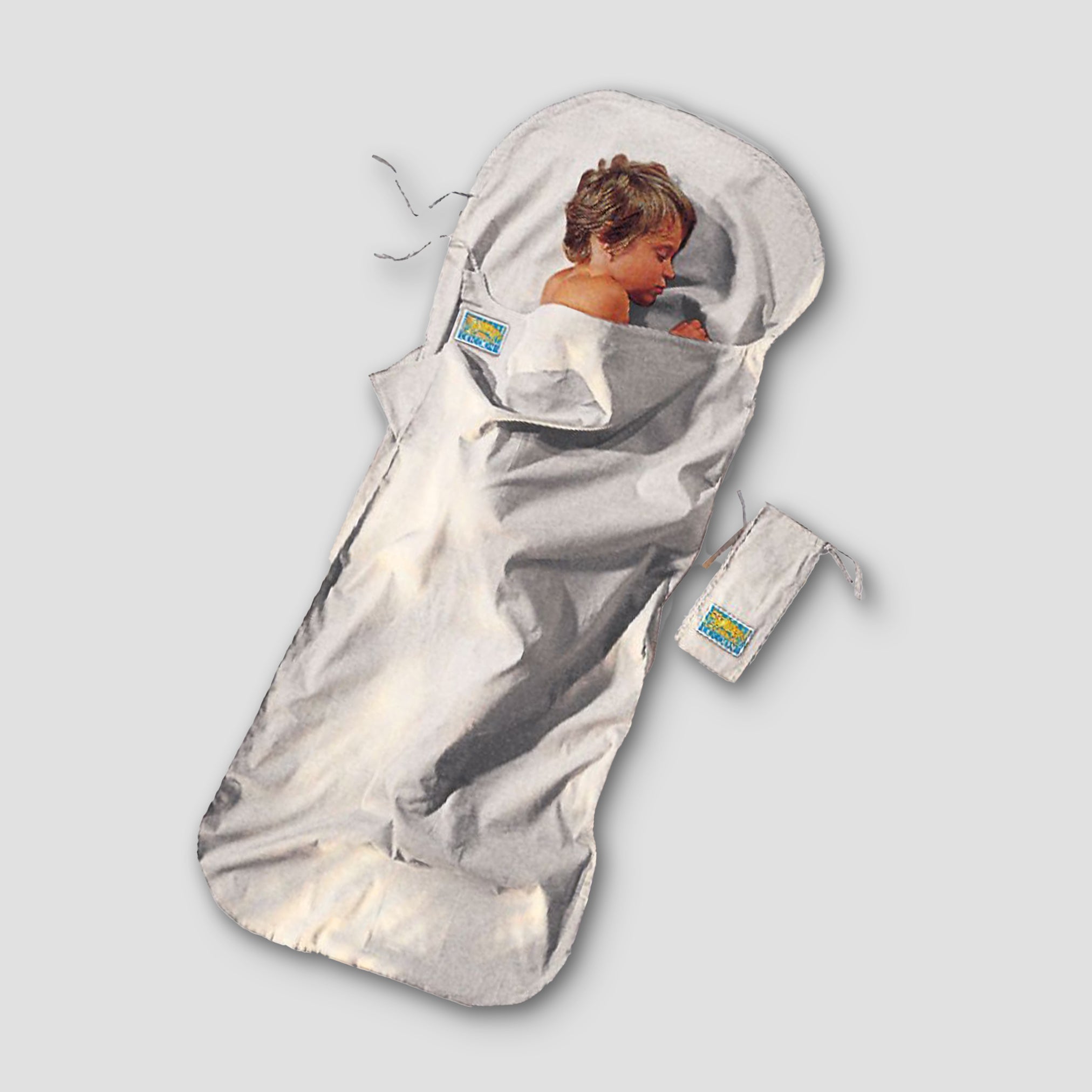 Kids TravelSheet™ Cotton by COCOON, lightweight white cotton sleeping bag for children, shown laid out flat.