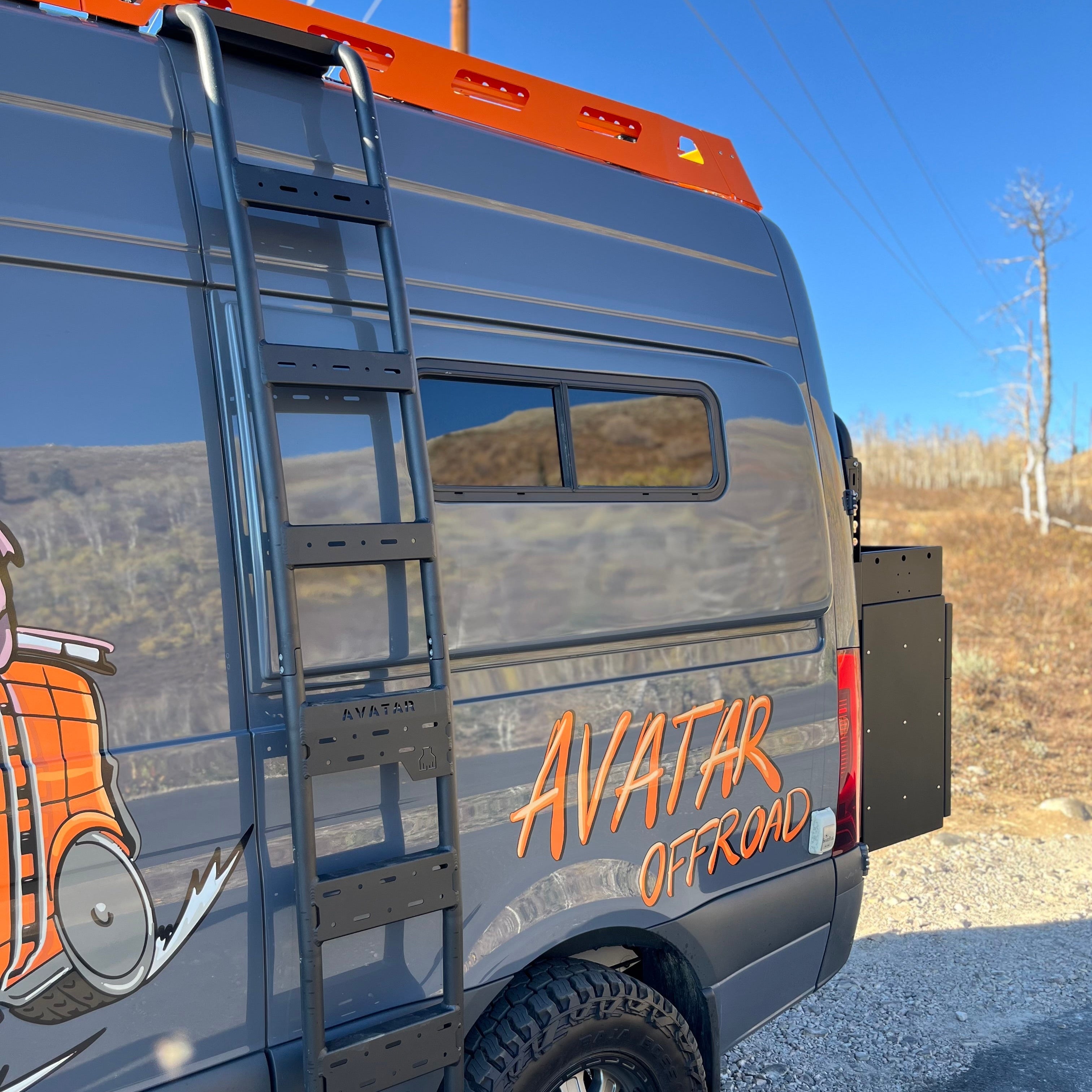 Mercedes Sprinter Van side ladder by Avatar Offroad, rugged metal ladder installed on the van's side for easy access.