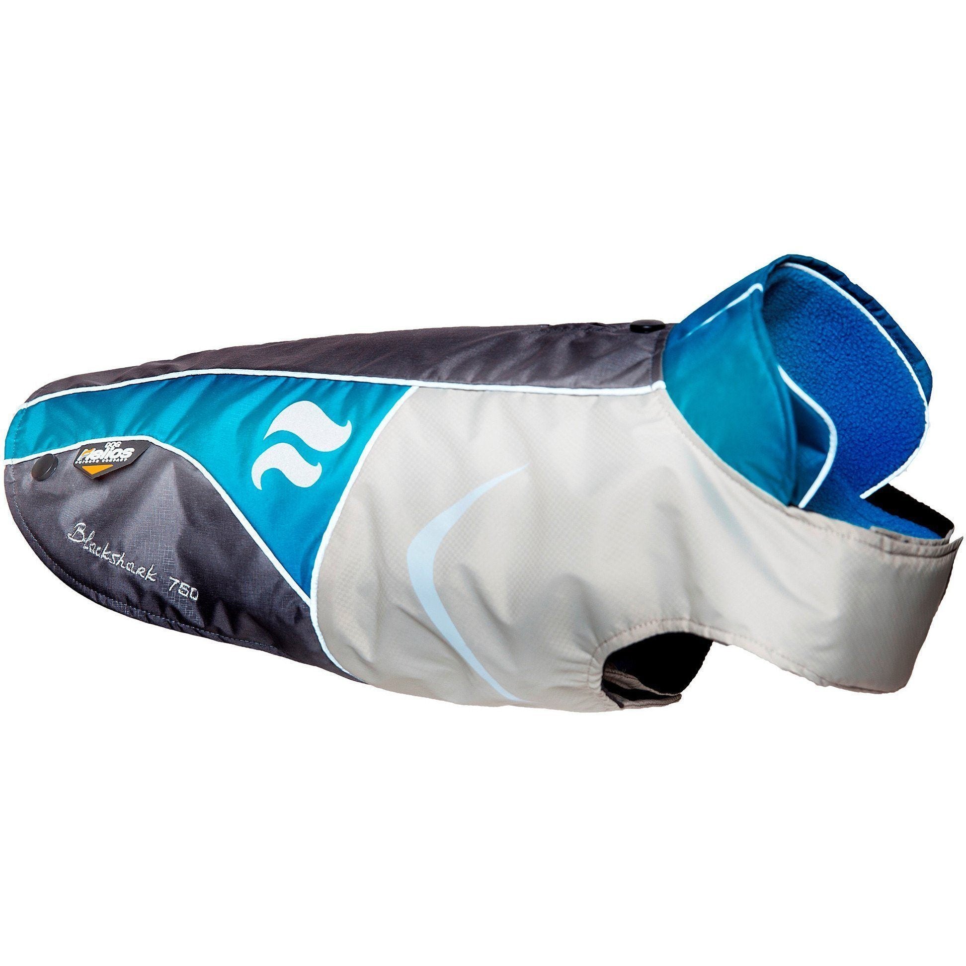 Dog wearing Pet Life Helios Lotus-Rusher 2-in-1 waterproof dog jacket with dual removable layers and blackshark technology.