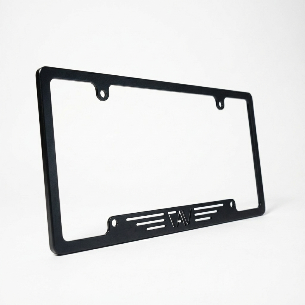 Canyon Adventure Vans made in Utah CAV license plate holder mounted on a vehicle with a rugged outdoor background.