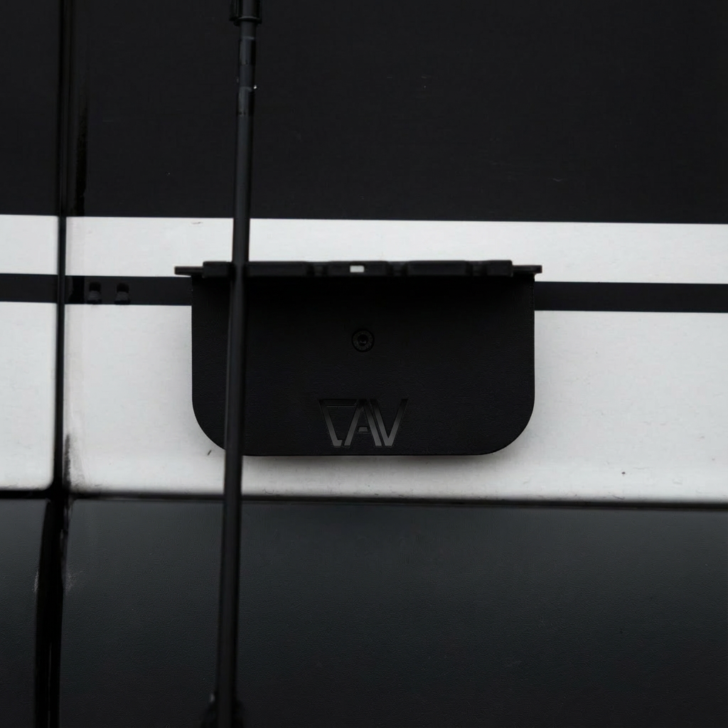 Magnetic fly rod holder by Canyon Adventure Vans, made in Utah, showing durable black mount with magnetic attachment for fishing rods.