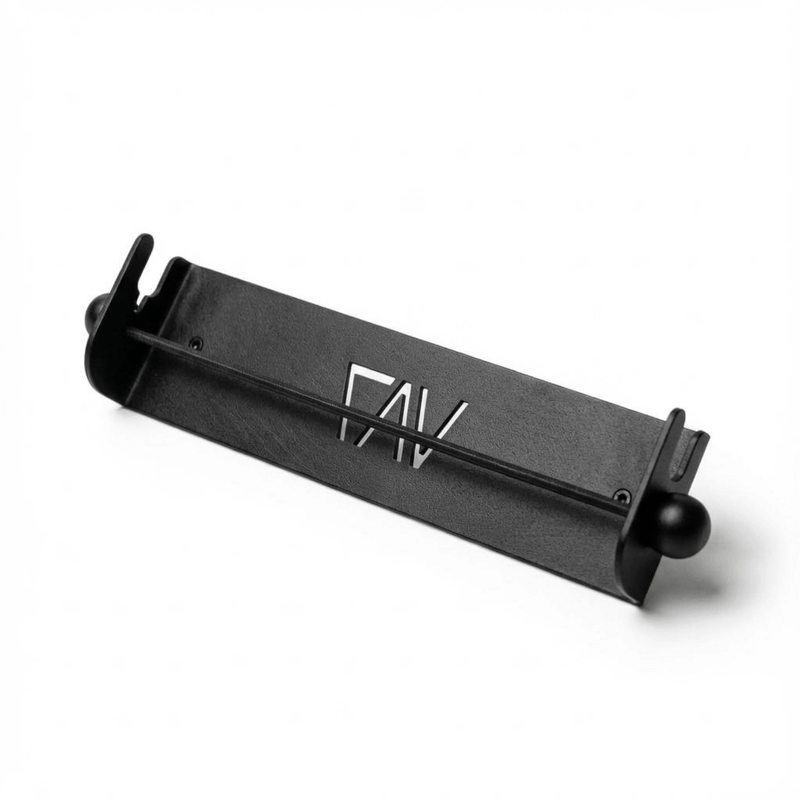 Magnetic ski and snowboard holder by Canyon Adventure Vans, made in Utah, securely holding skis and snowboards with a sleek design.