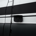 Magnetic fly rod holder by Canyon Adventure Vans, made in Utah, showcasing a sleek black holder attached to a vehicle or gear.