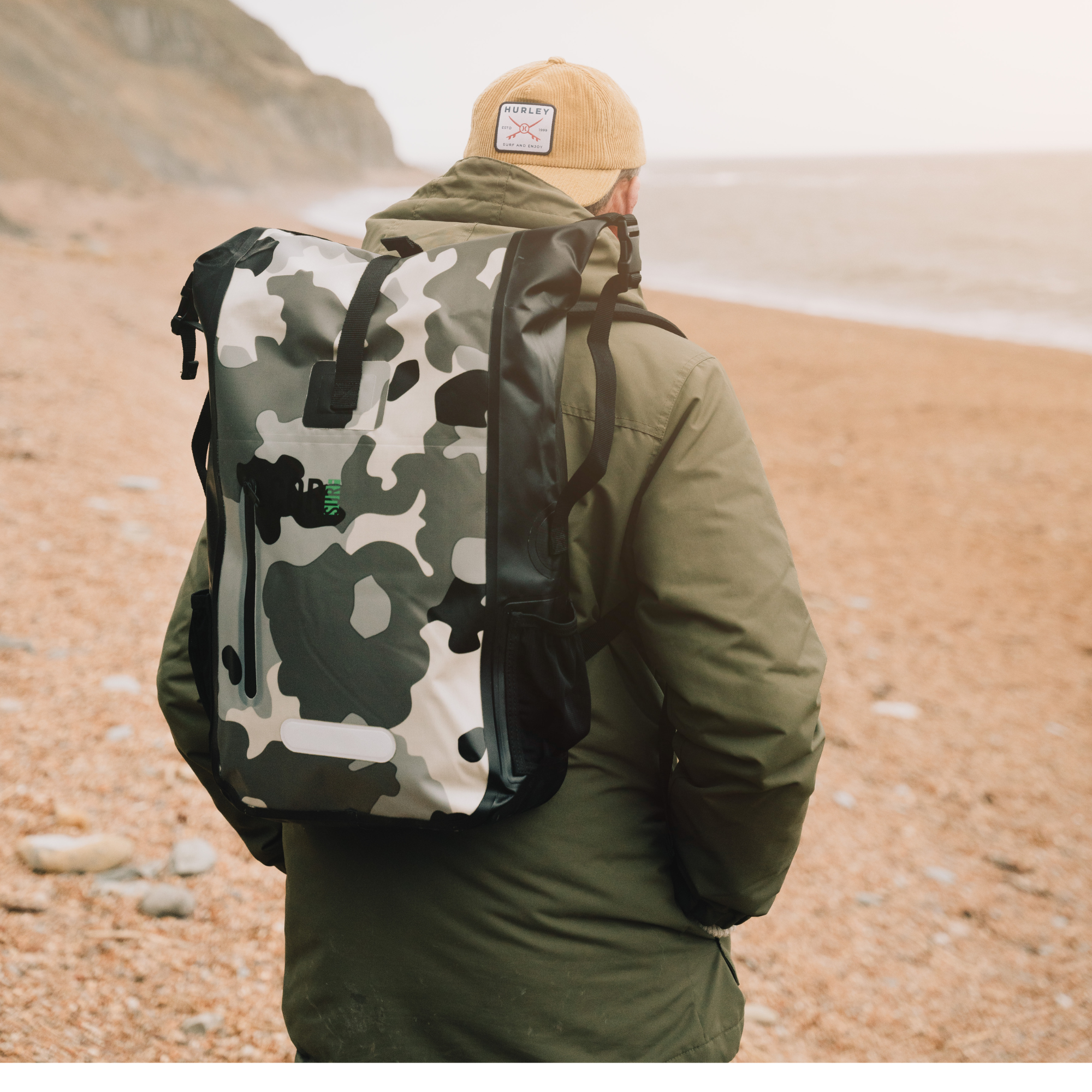 COR Surf 40L waterproof dry bag backpack shown with secure roll-top closure and adjustable straps, ideal for outdoor water activities.