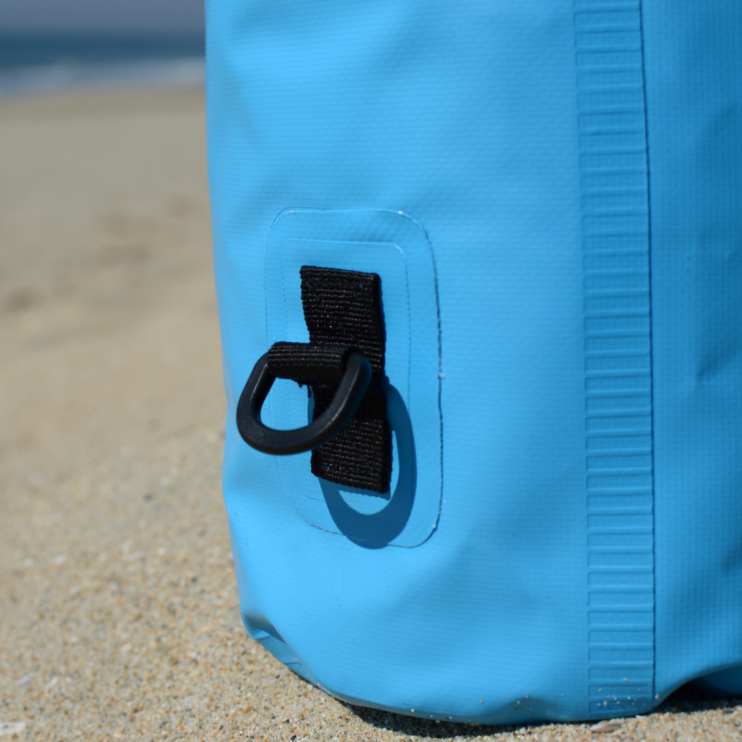 COR Surf dry bag with shoulder strap in 3L, 5L, 10L, or 15L sizes, waterproof accessories for outdoor adventures
